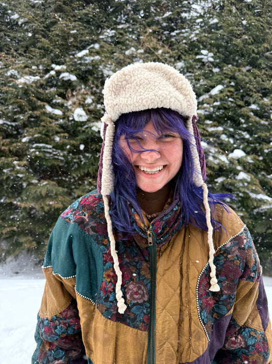 Purple corduroy ushanka with white fluffy lining