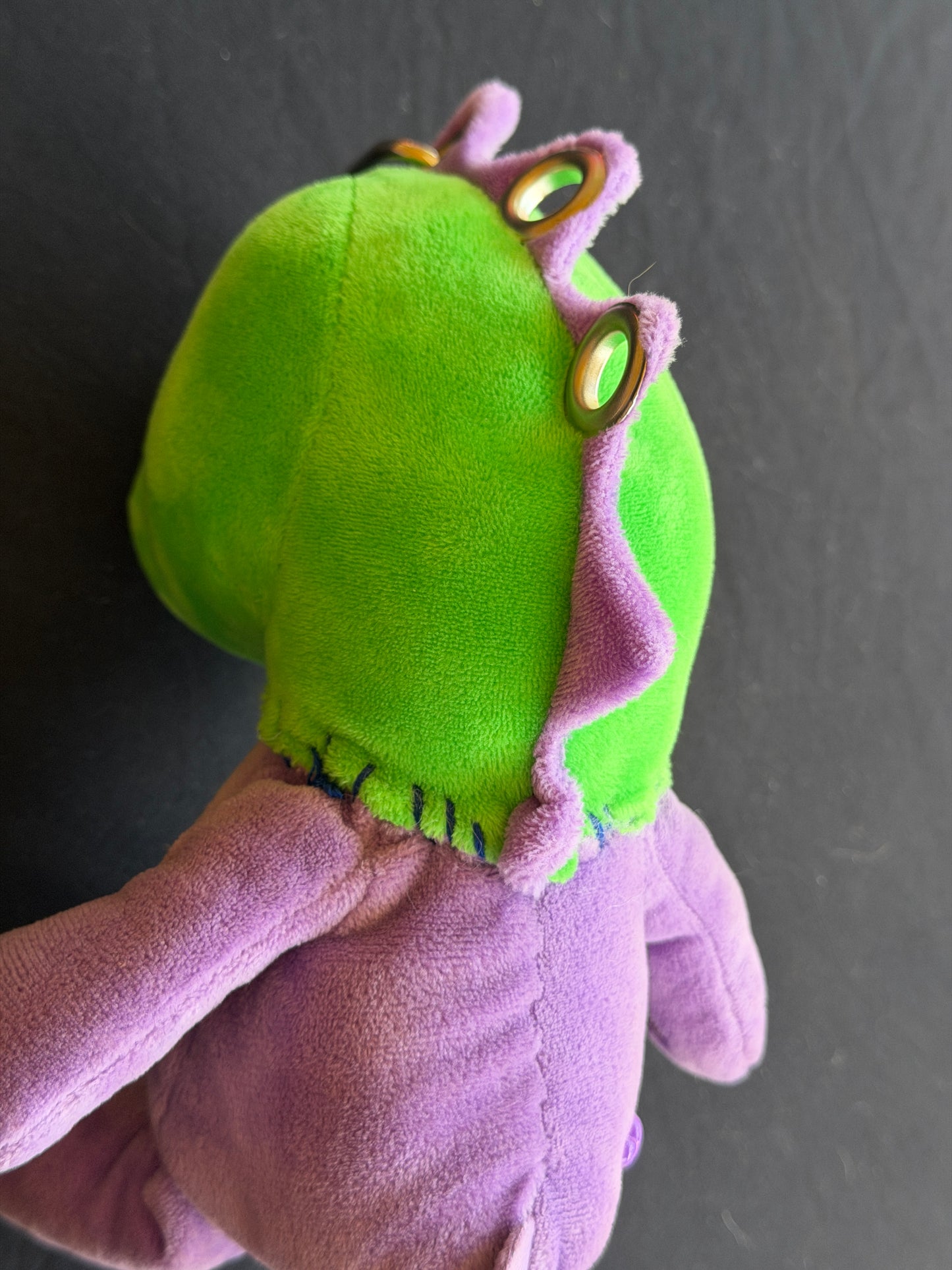 Dinosaur + purple care bear keychain buddy