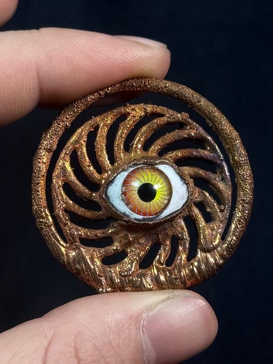 Eye spiral amulet