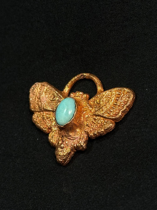 Aquamarine moth amulet