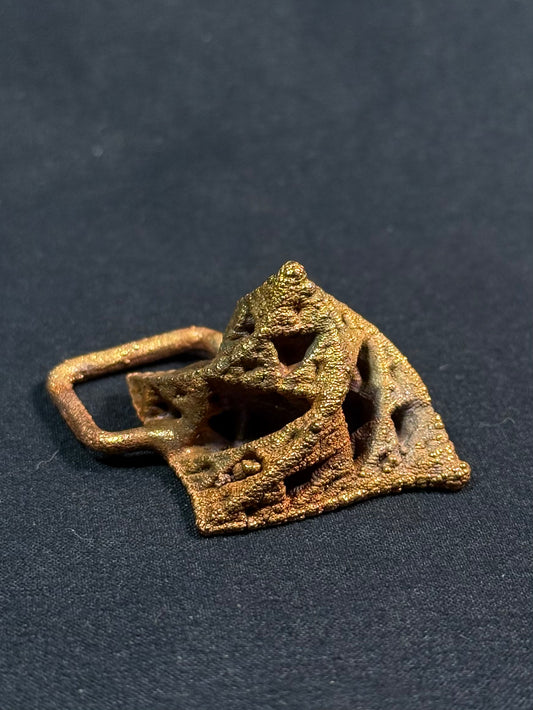 Warped pyramid amulet