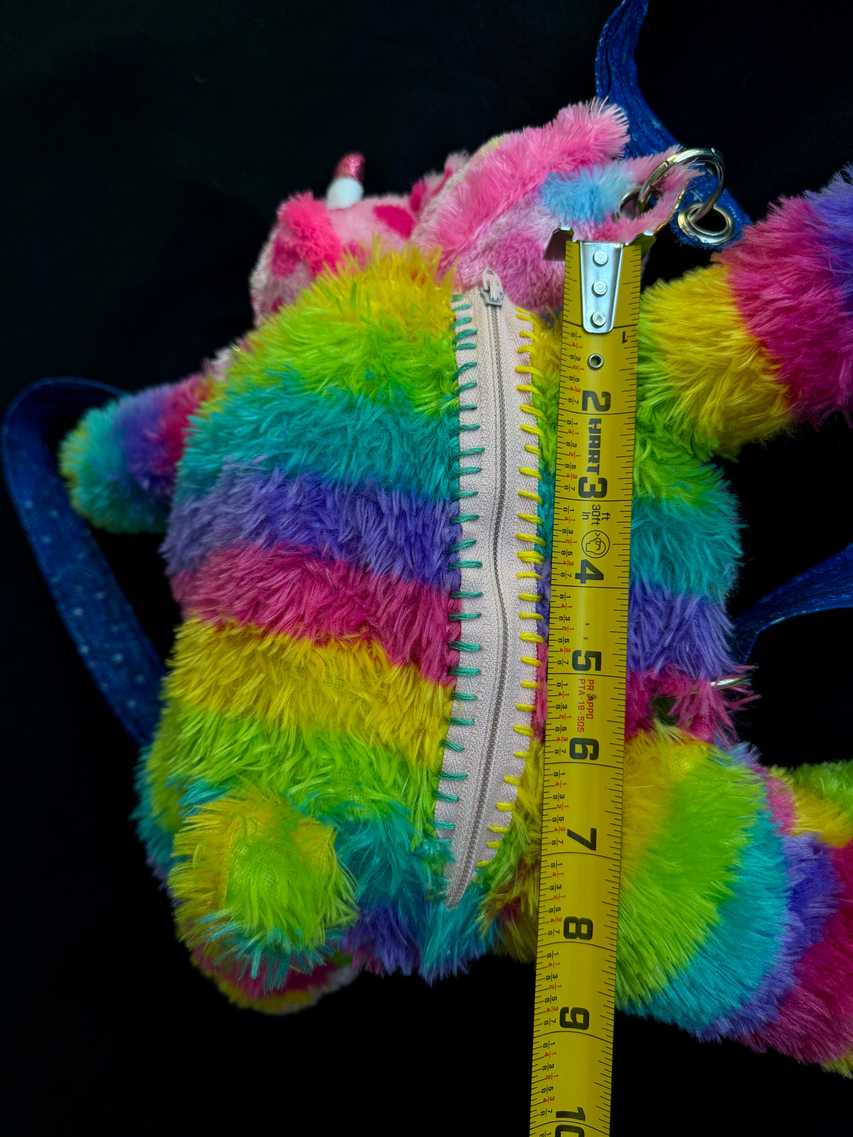 Two headed rainbow explosion hybrid back pack