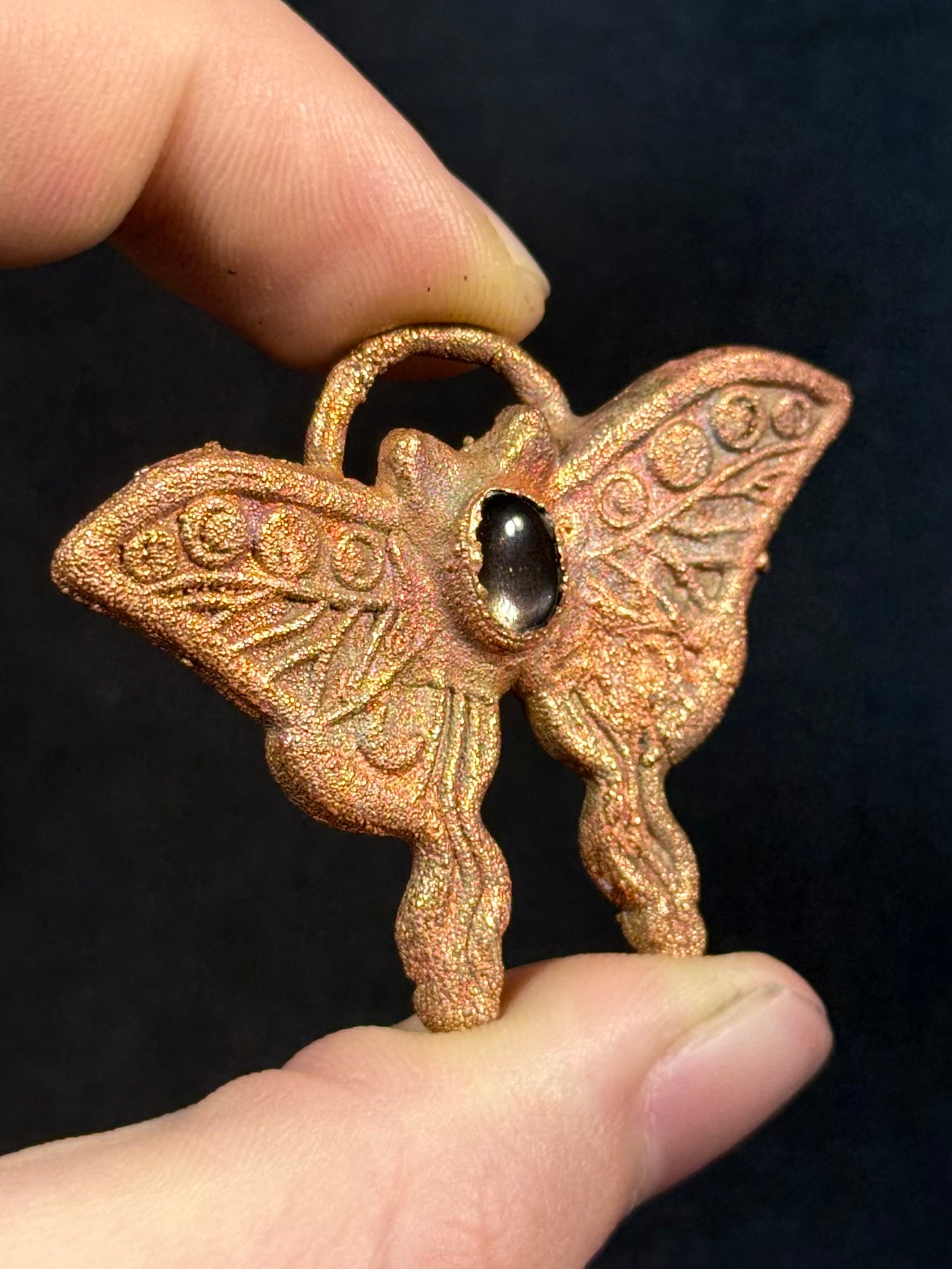 Obsidian butterfly amulet