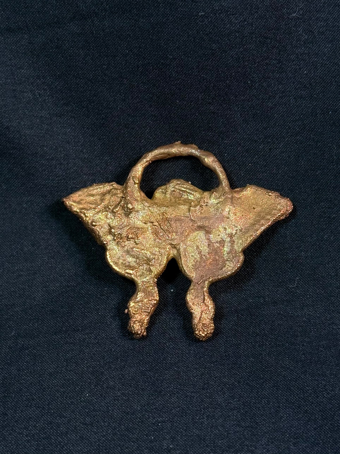 Eye butterfly amulet