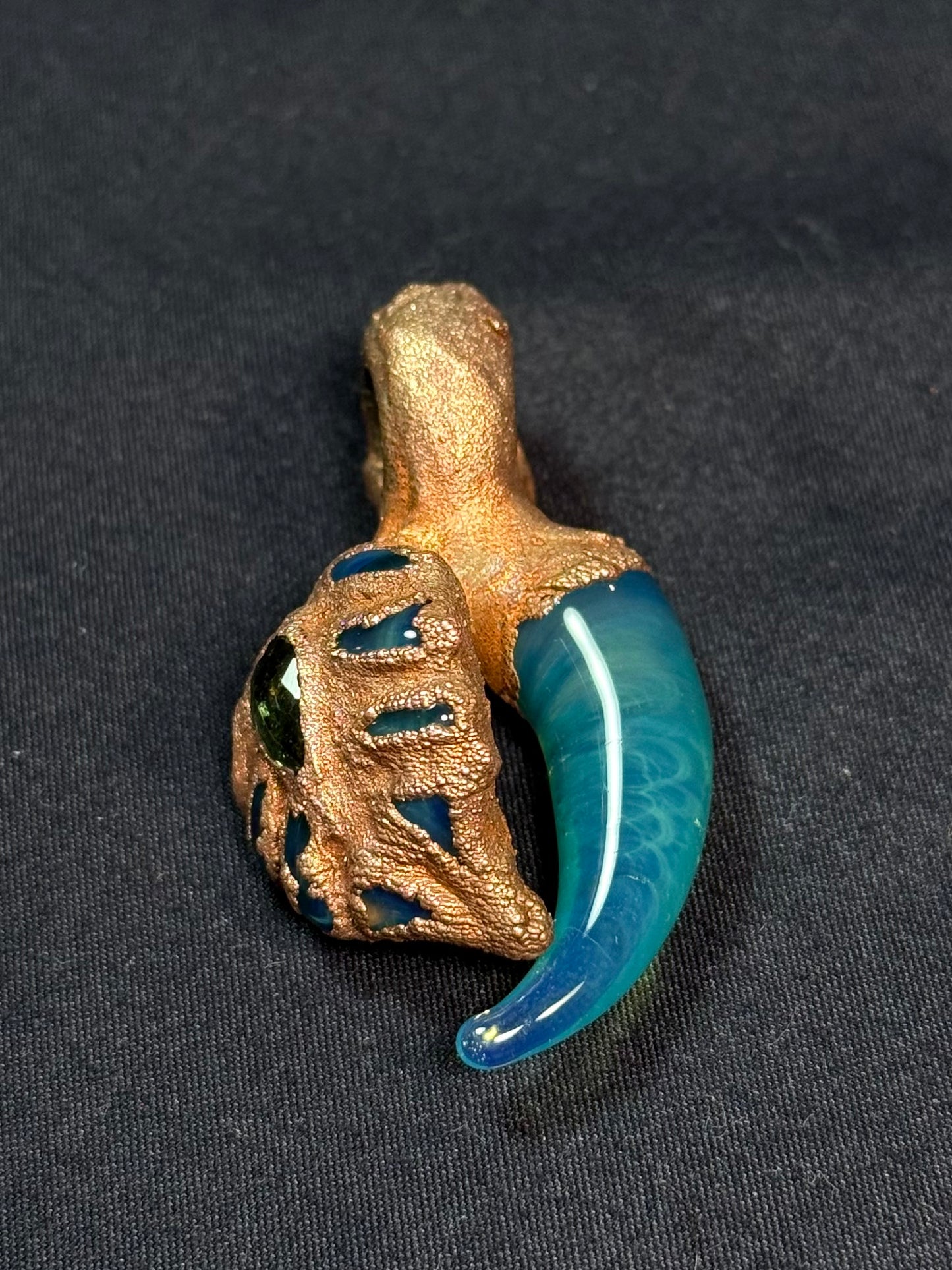 Glass leaf amulet