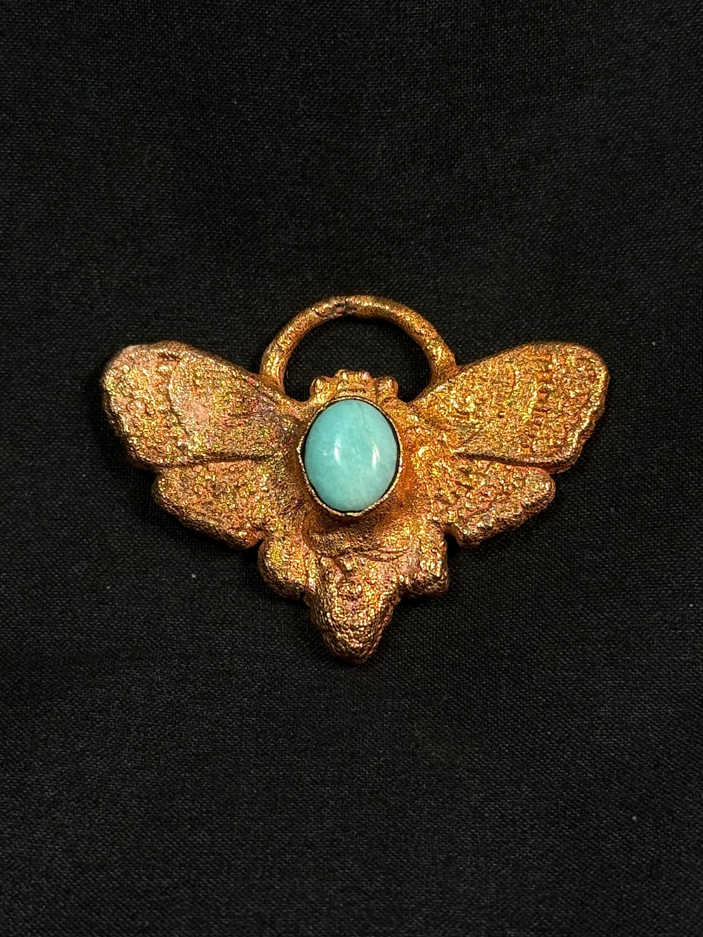 Aquamarine moth amulet