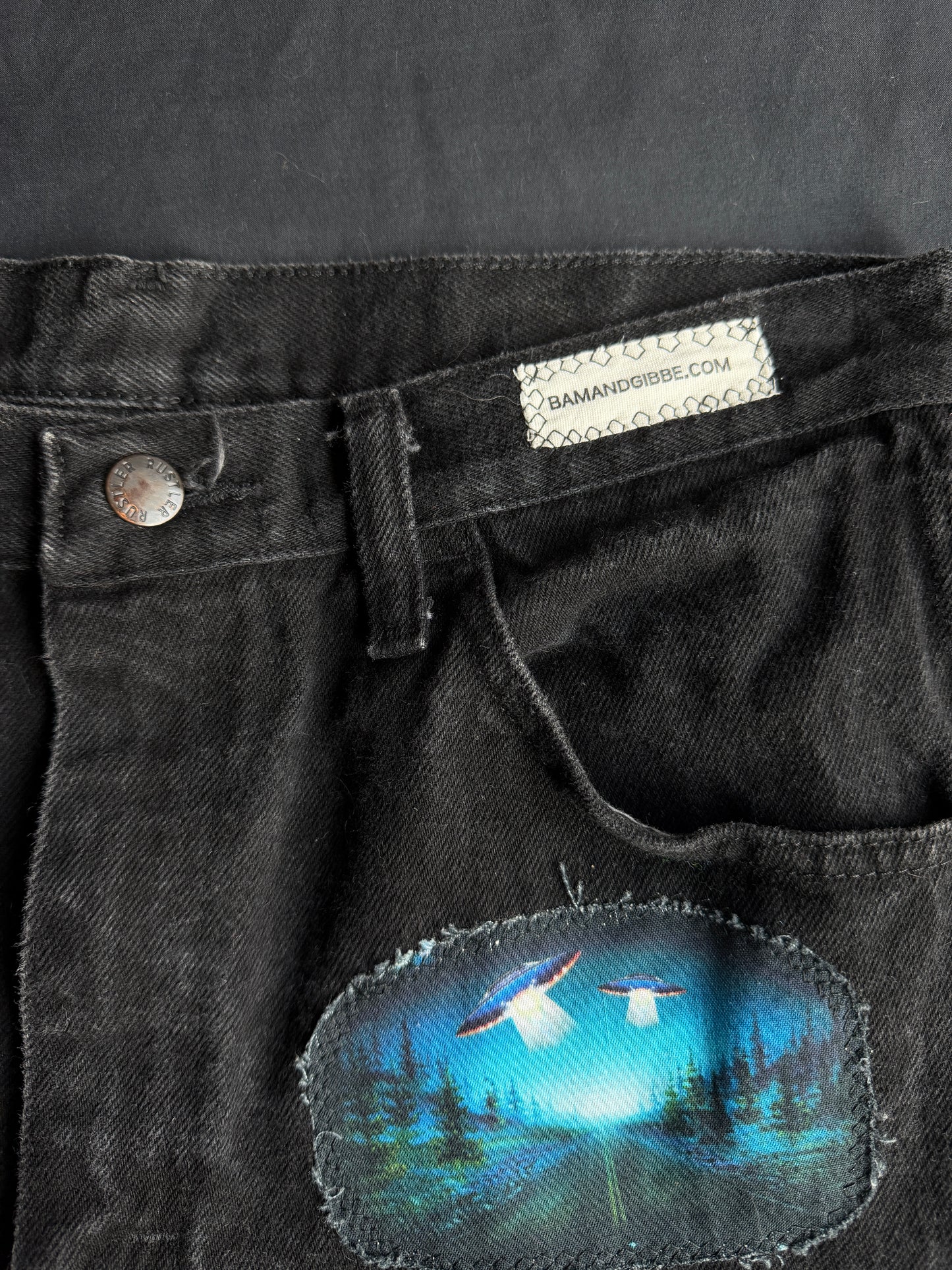 Alien + UFO black jean shorts