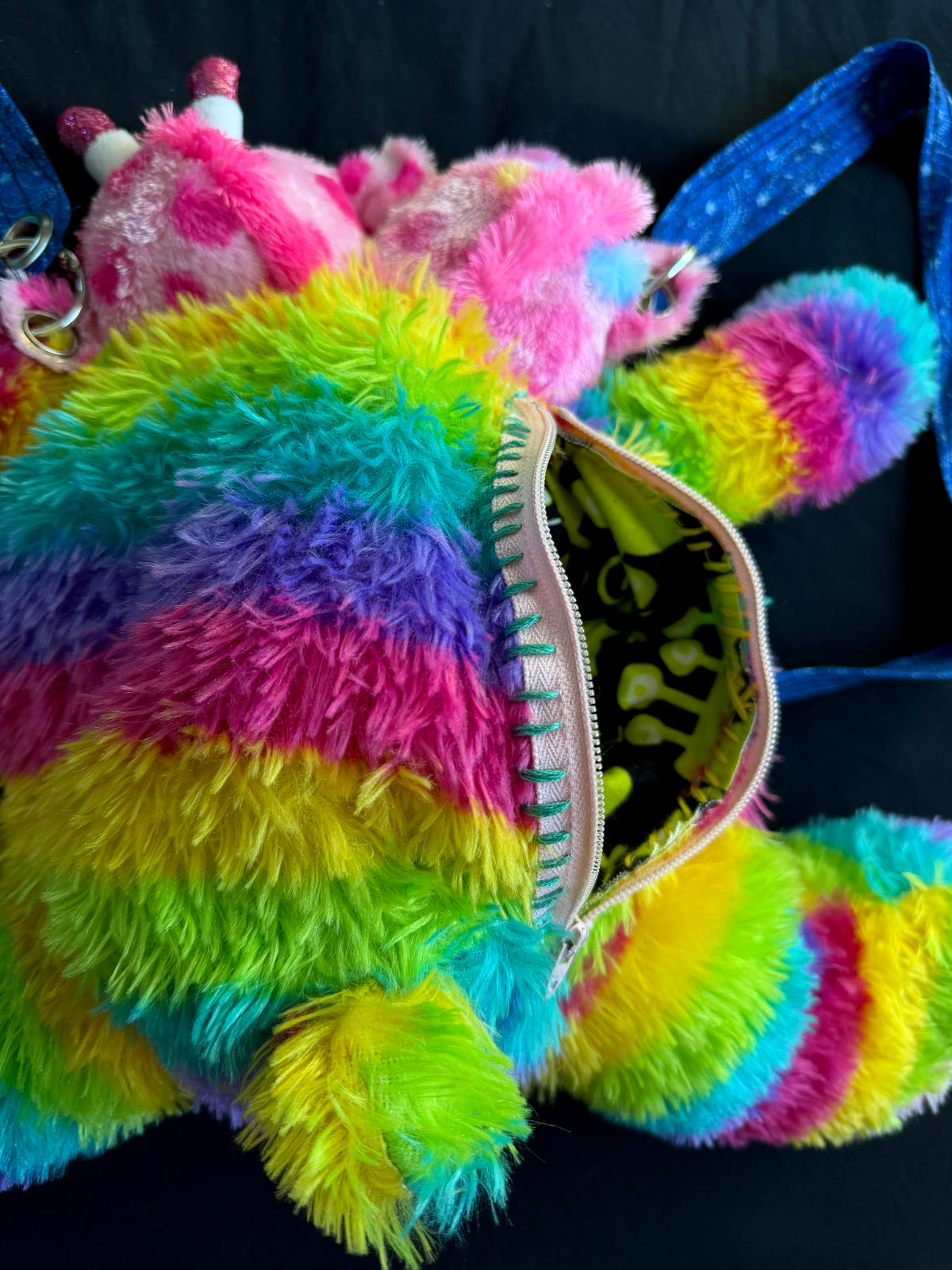 Two headed rainbow explosion hybrid back pack