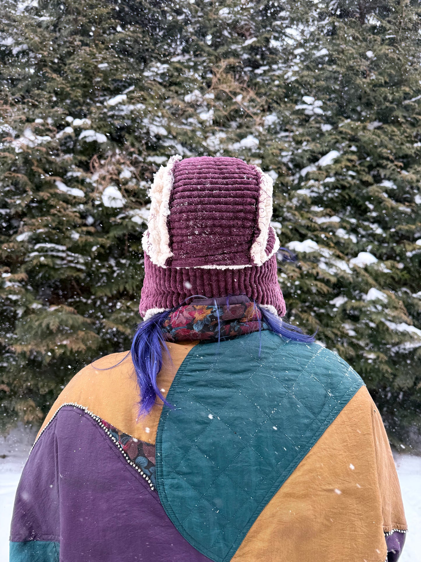 Purple corduroy ushanka with white fluffy lining