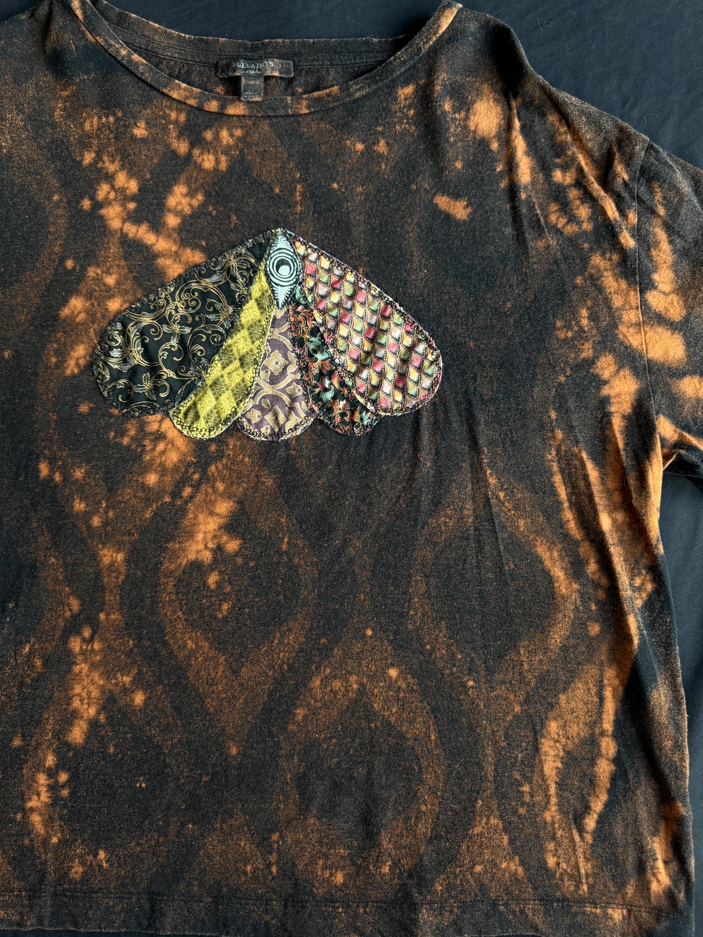 Moth patch bleach dyed t-shirt