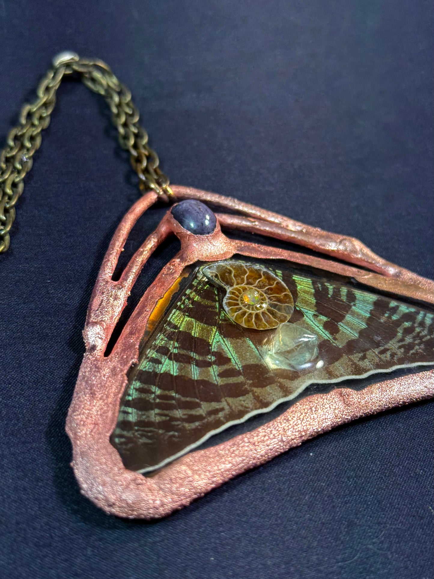 Star sapphire sunset moth amulet