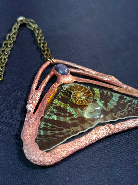 Star sapphire sunset moth amulet