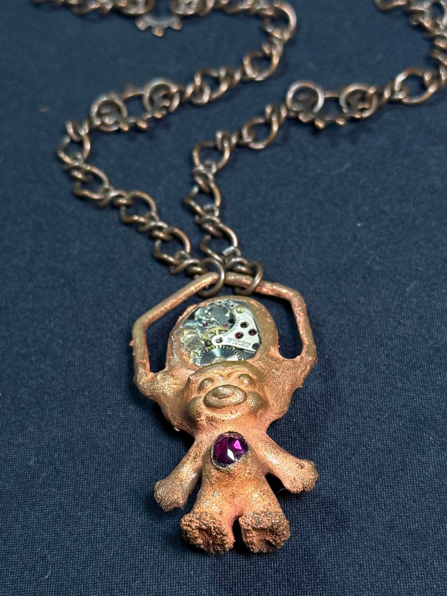 Father Time troll amulet