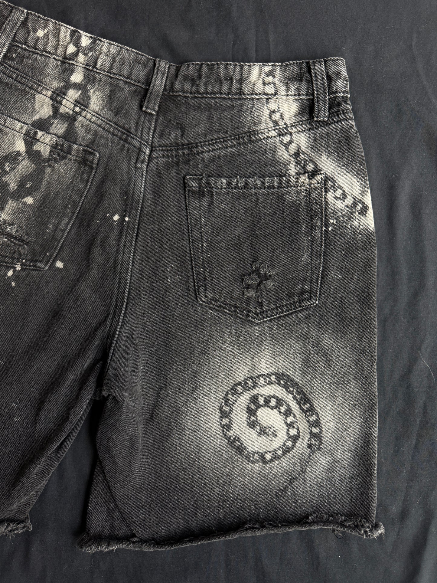 Chain bleach dyed black jean shorts