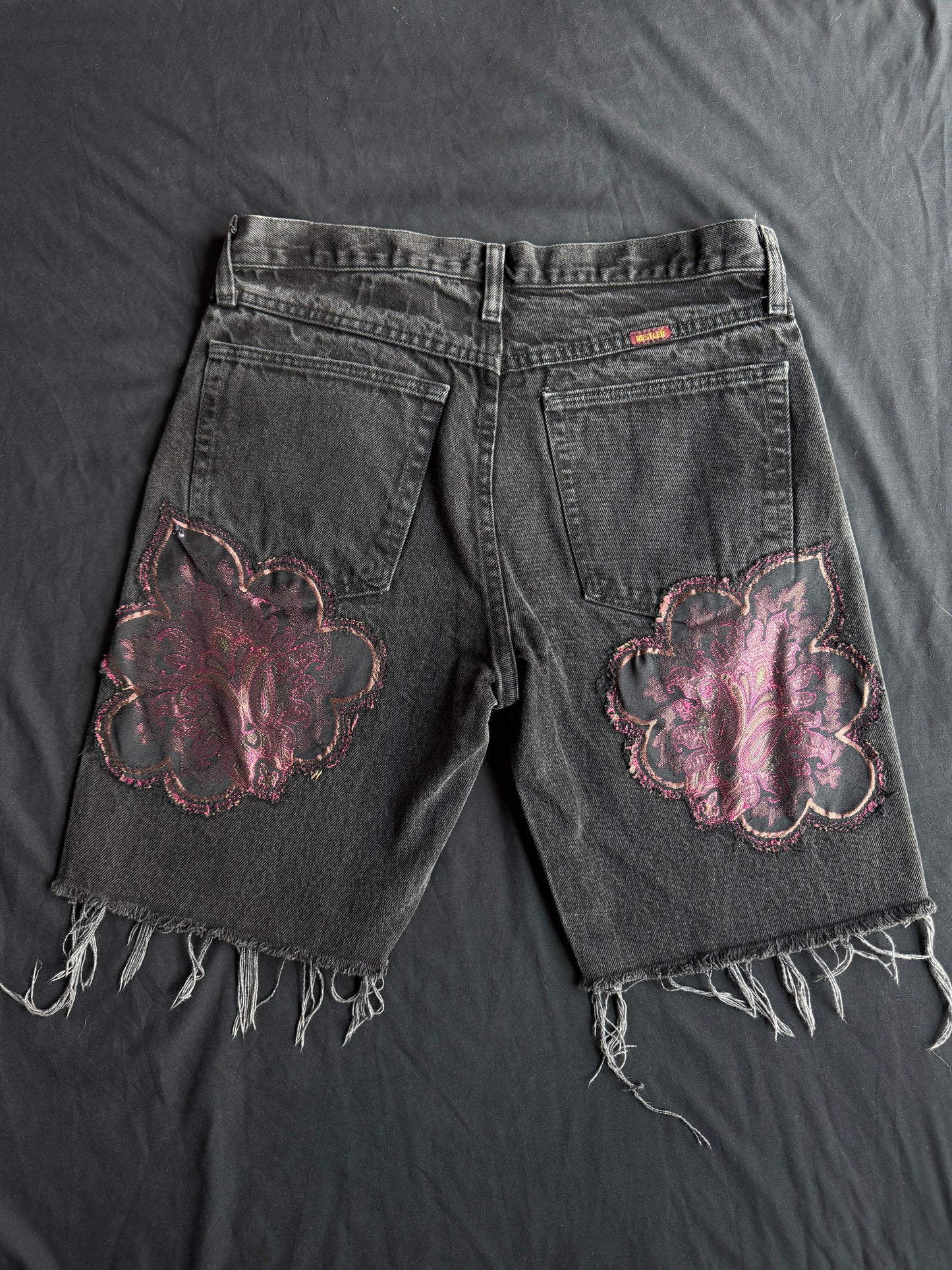 Purple magic black jean shorts
