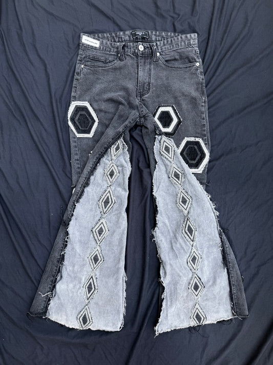 Black and white geometric denim pants with corduroy flair