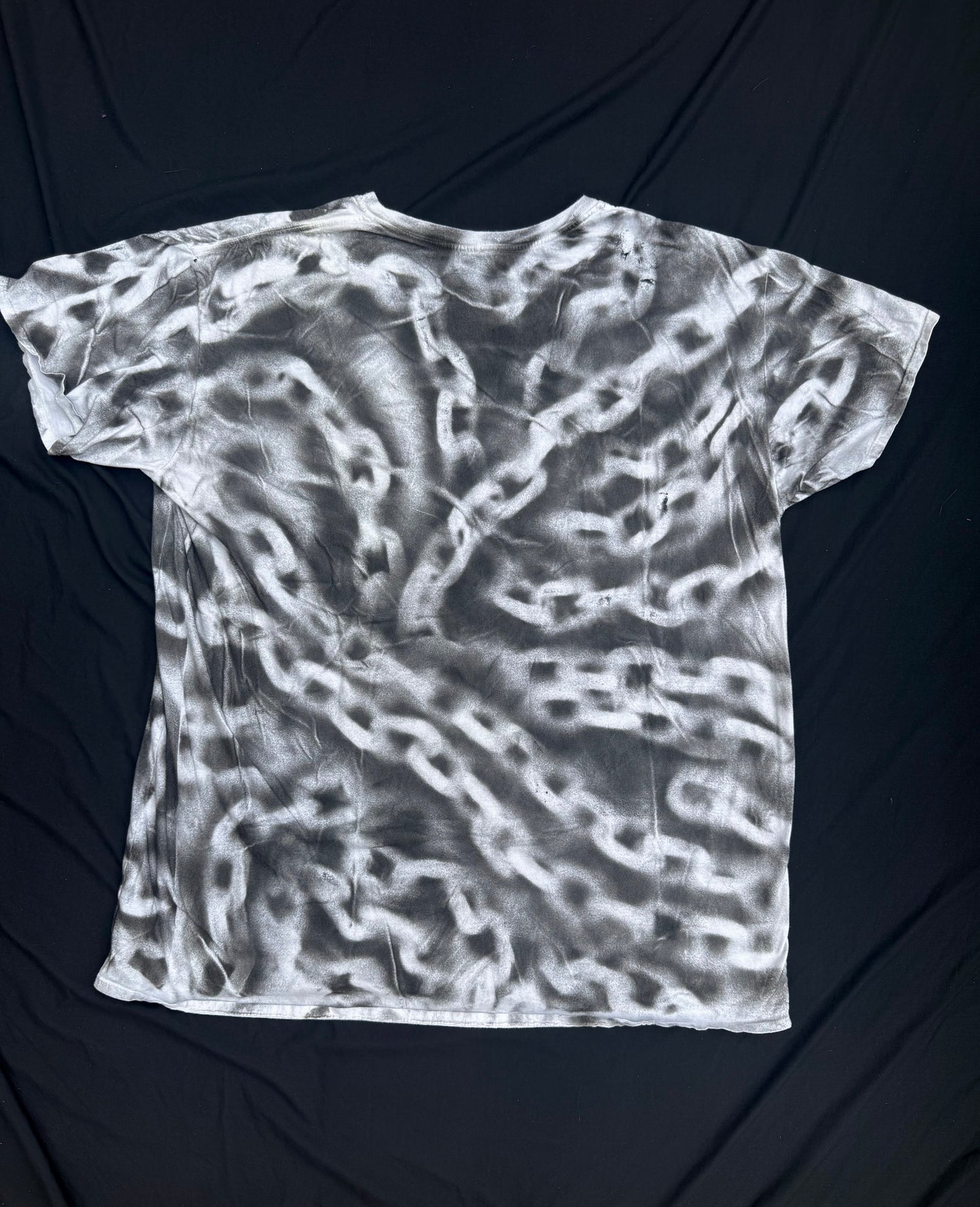 All seeing billy skull chain sprayed t shirt