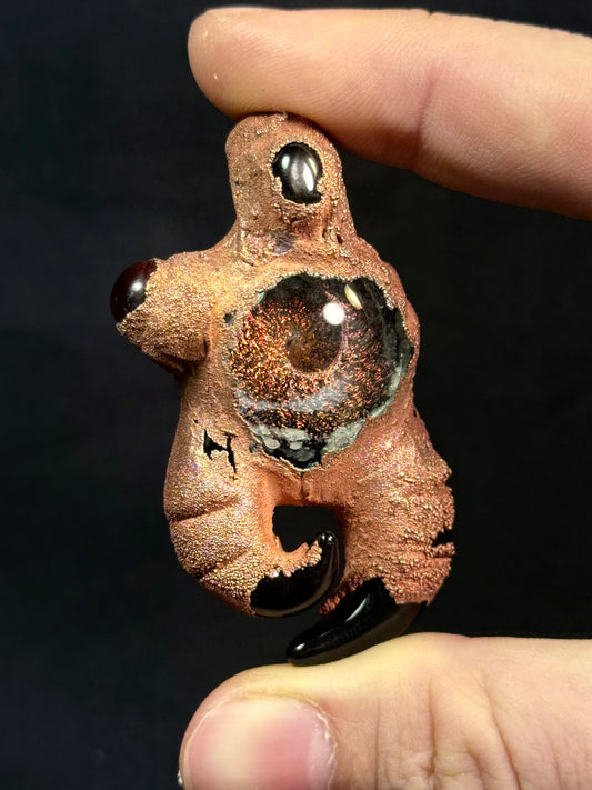 Spikey galaxy amulet