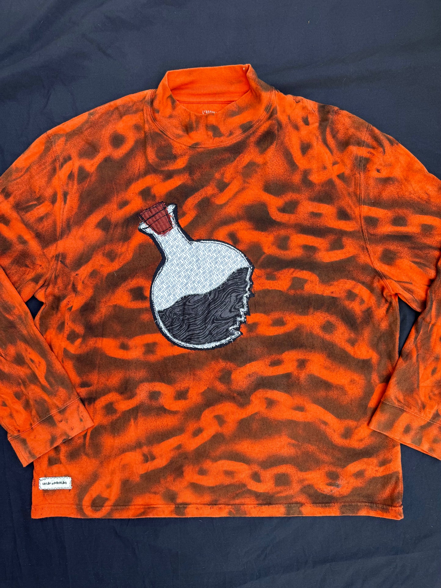 Chemical X chain spray painted shirt