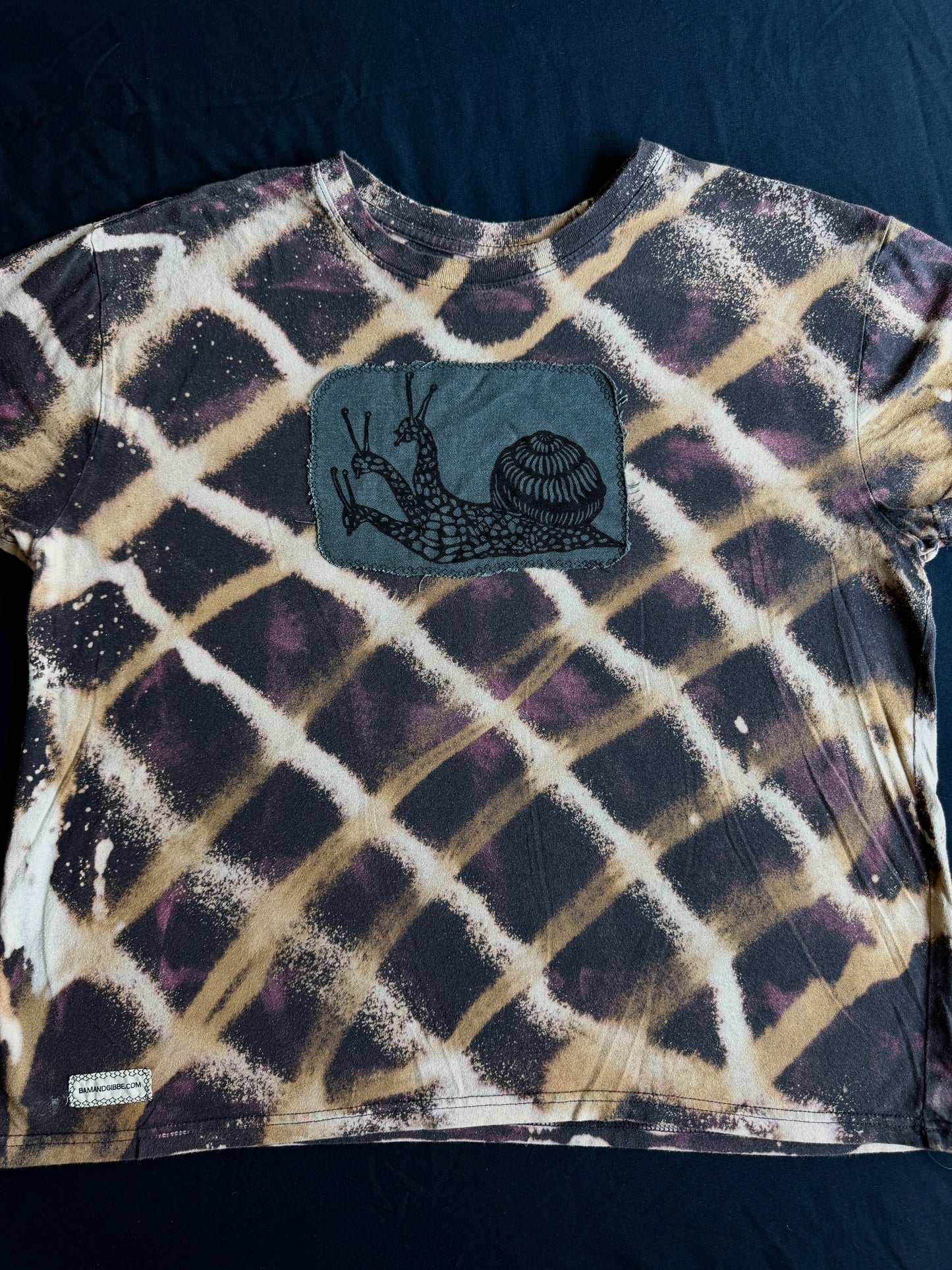 Three headed snail bleach dyed t-shirt