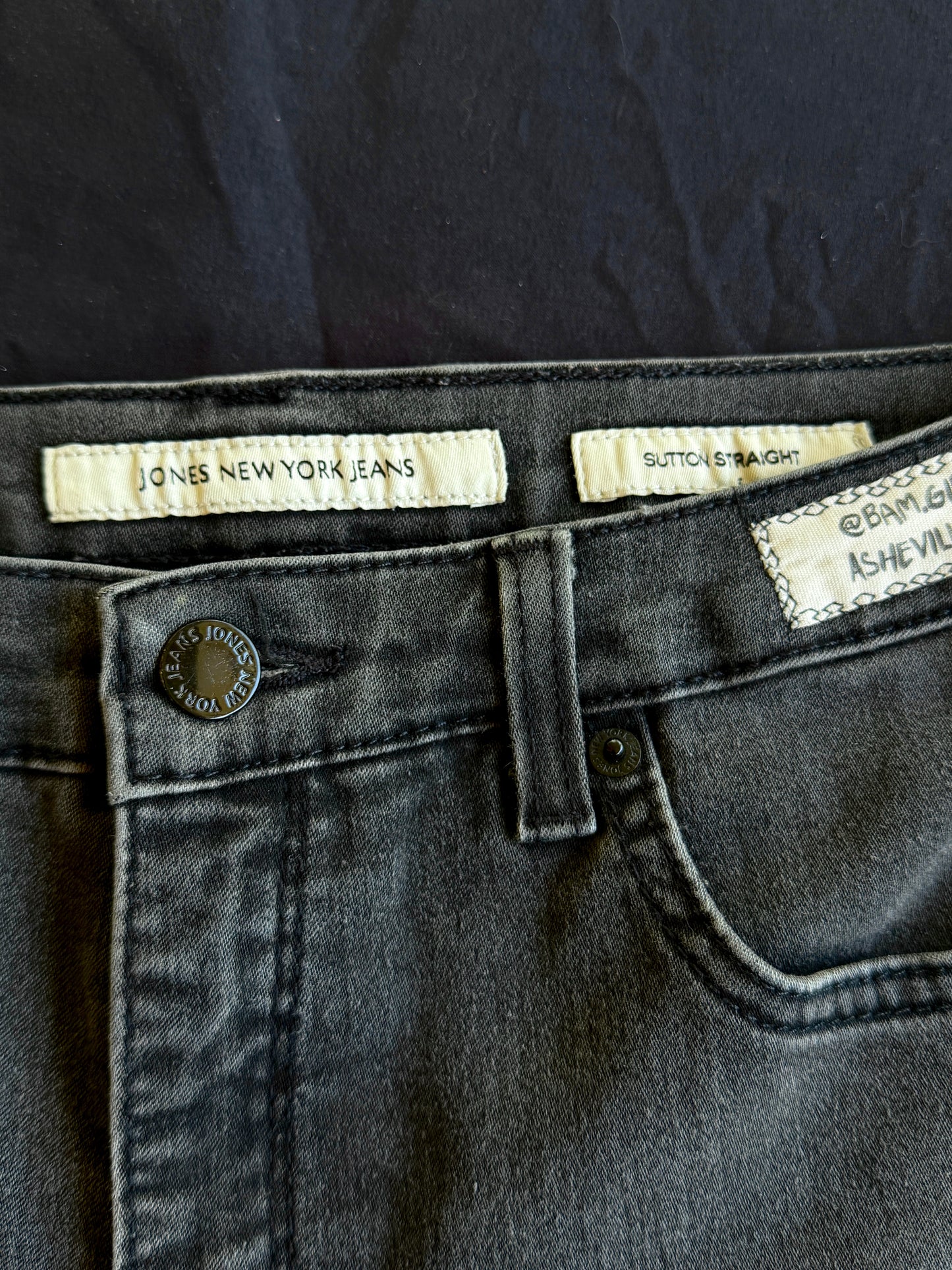 Black and white patch black jean shorts
