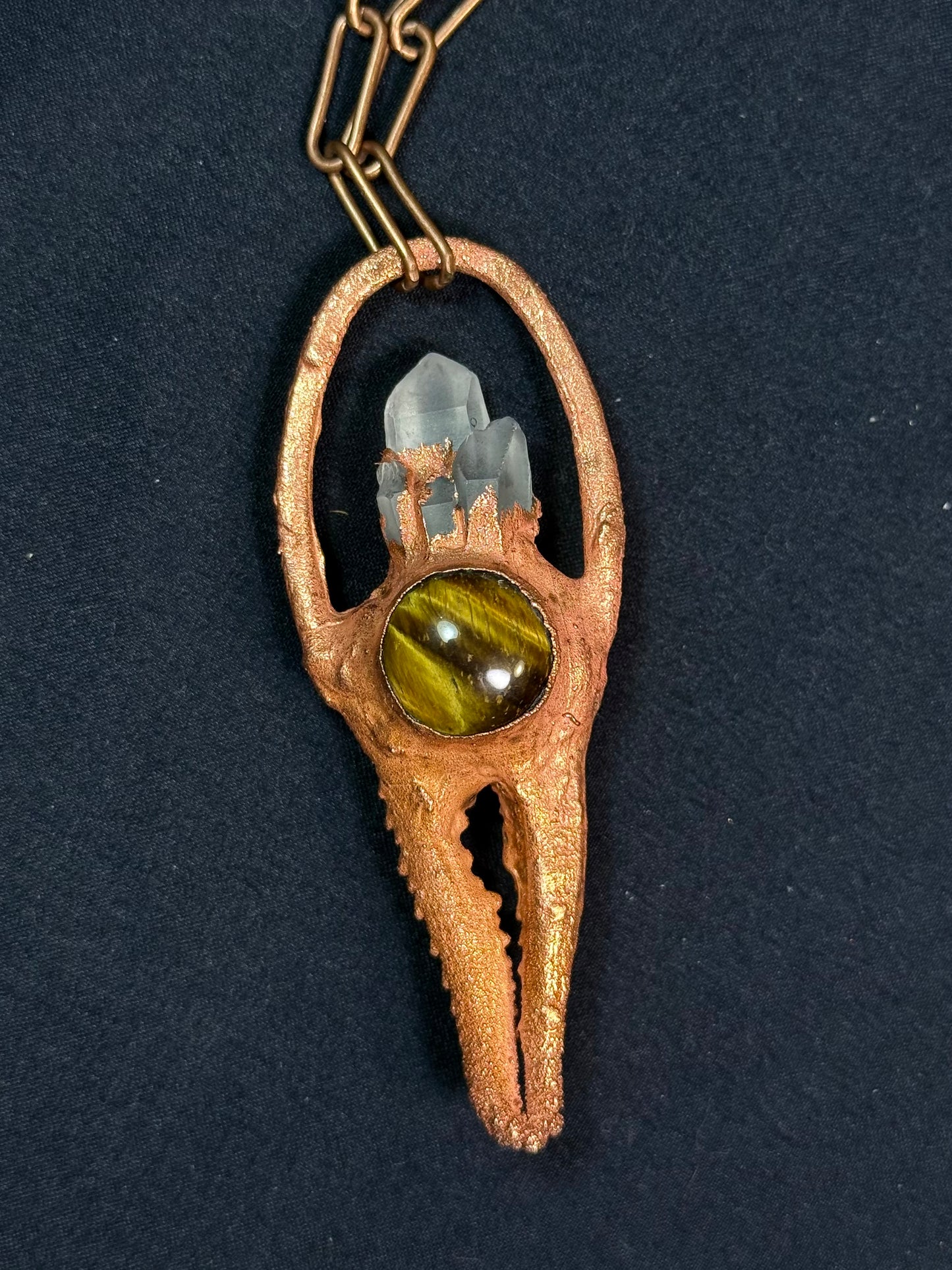 Crab claw amulet