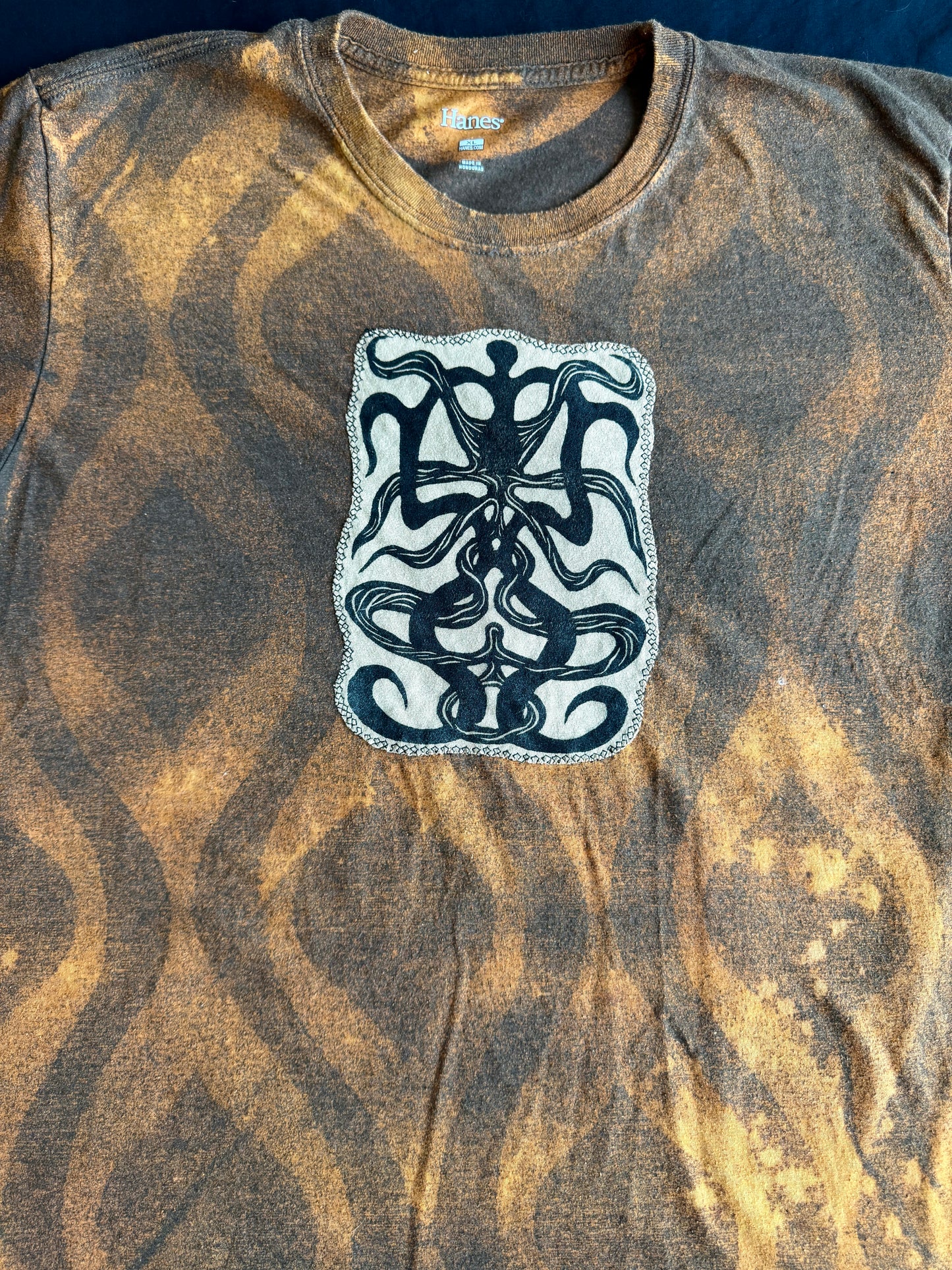Intertwined patch bleach dyed t-shirt