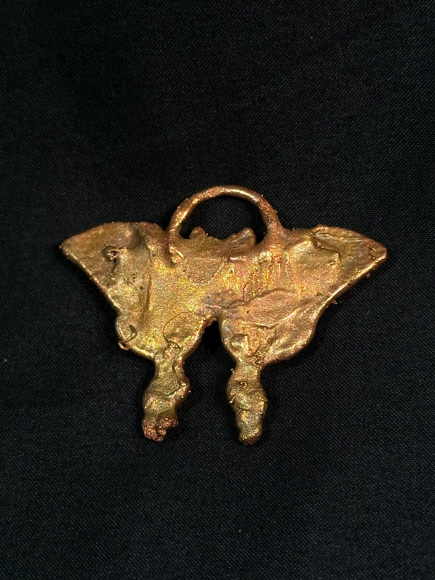 Eye butterfly amulet