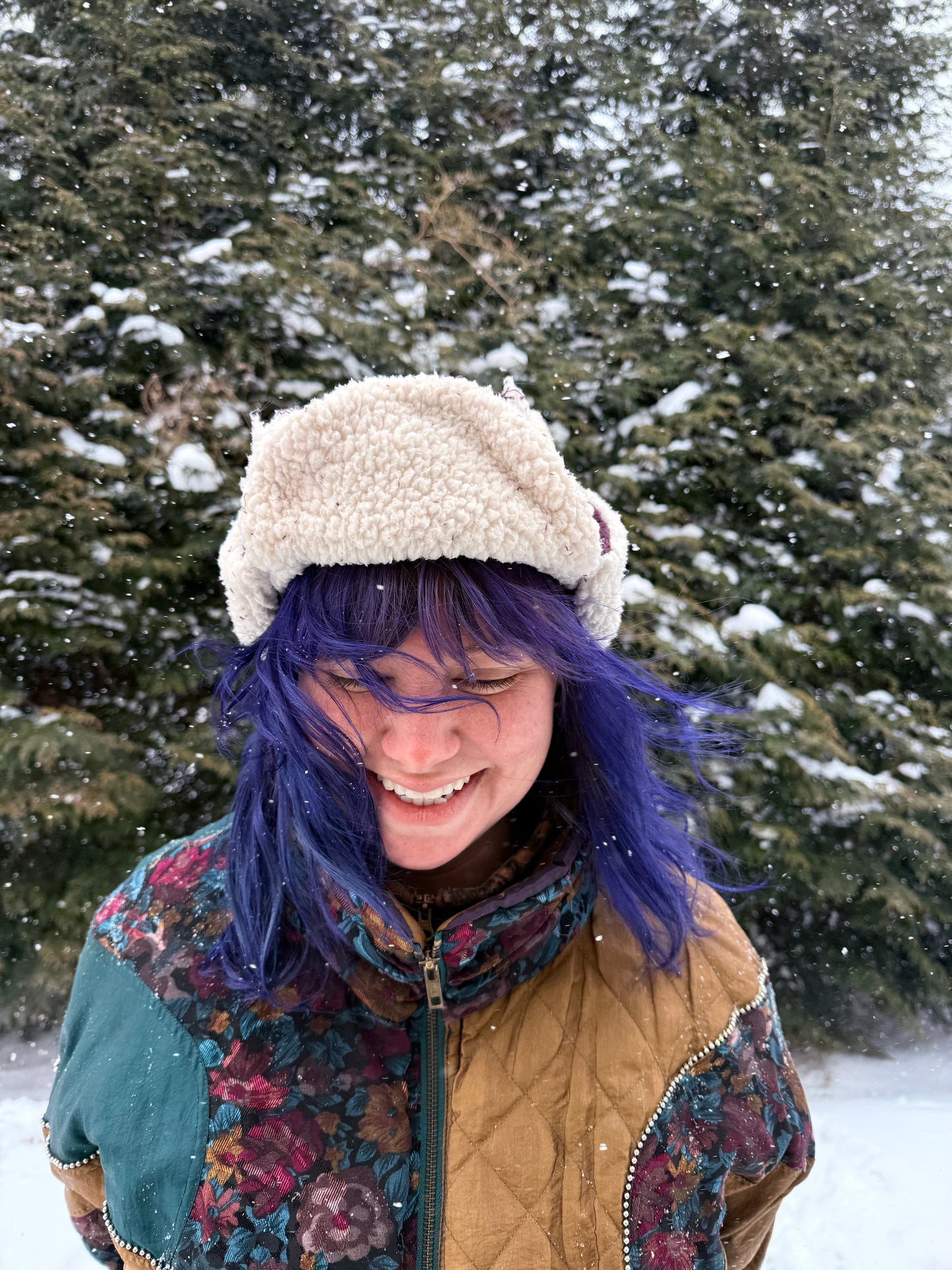 Purple corduroy ushanka with white fluffy lining
