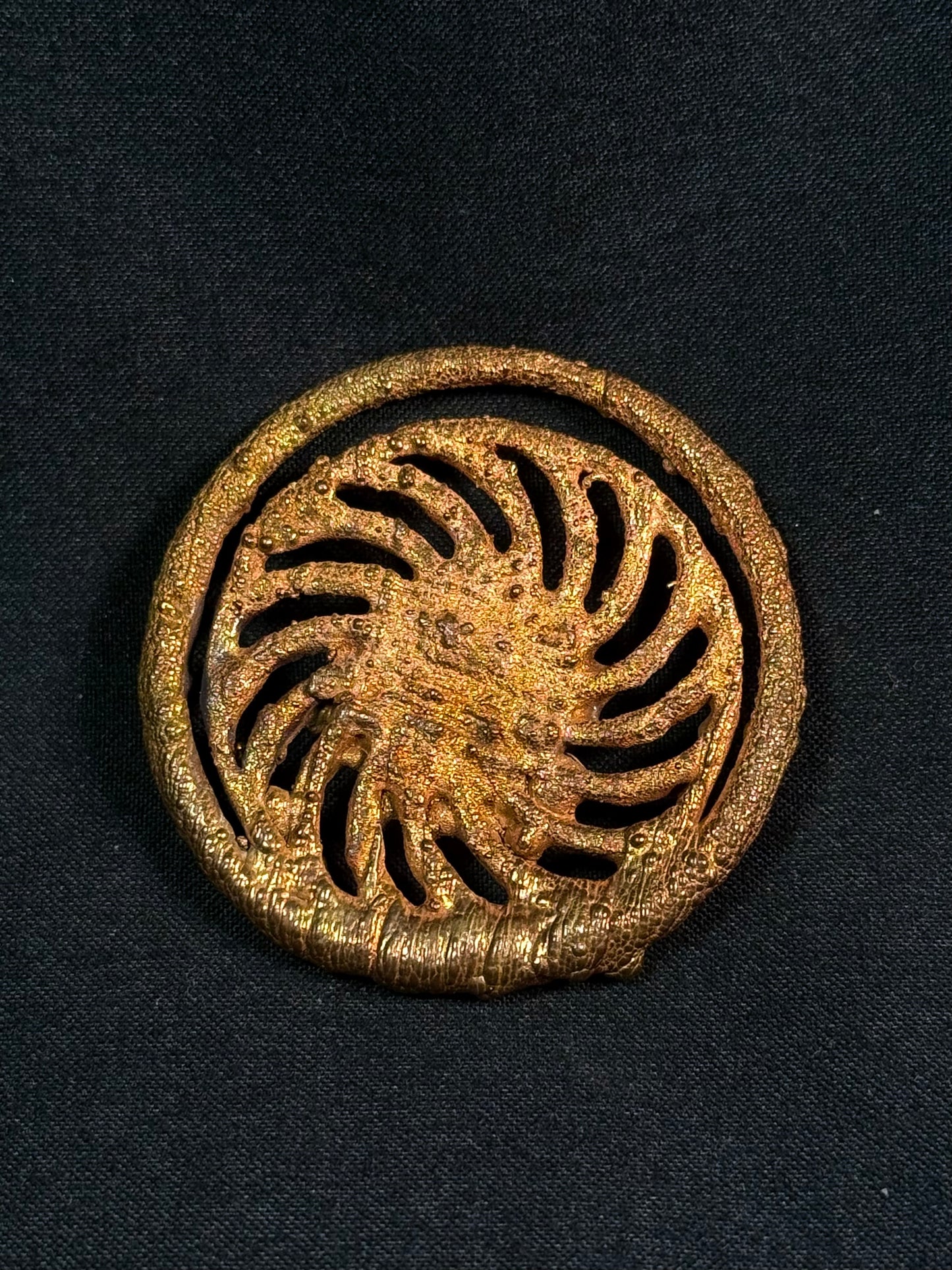 Eye spiral amulet