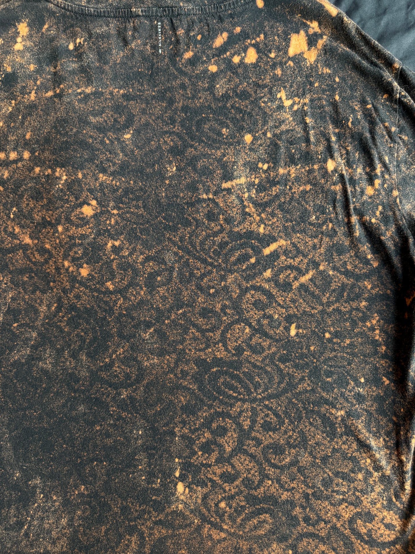 Moth patch bleach dyed t-shirt