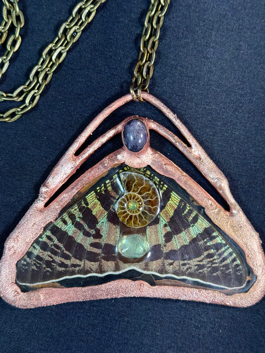 Star sapphire sunset moth amulet