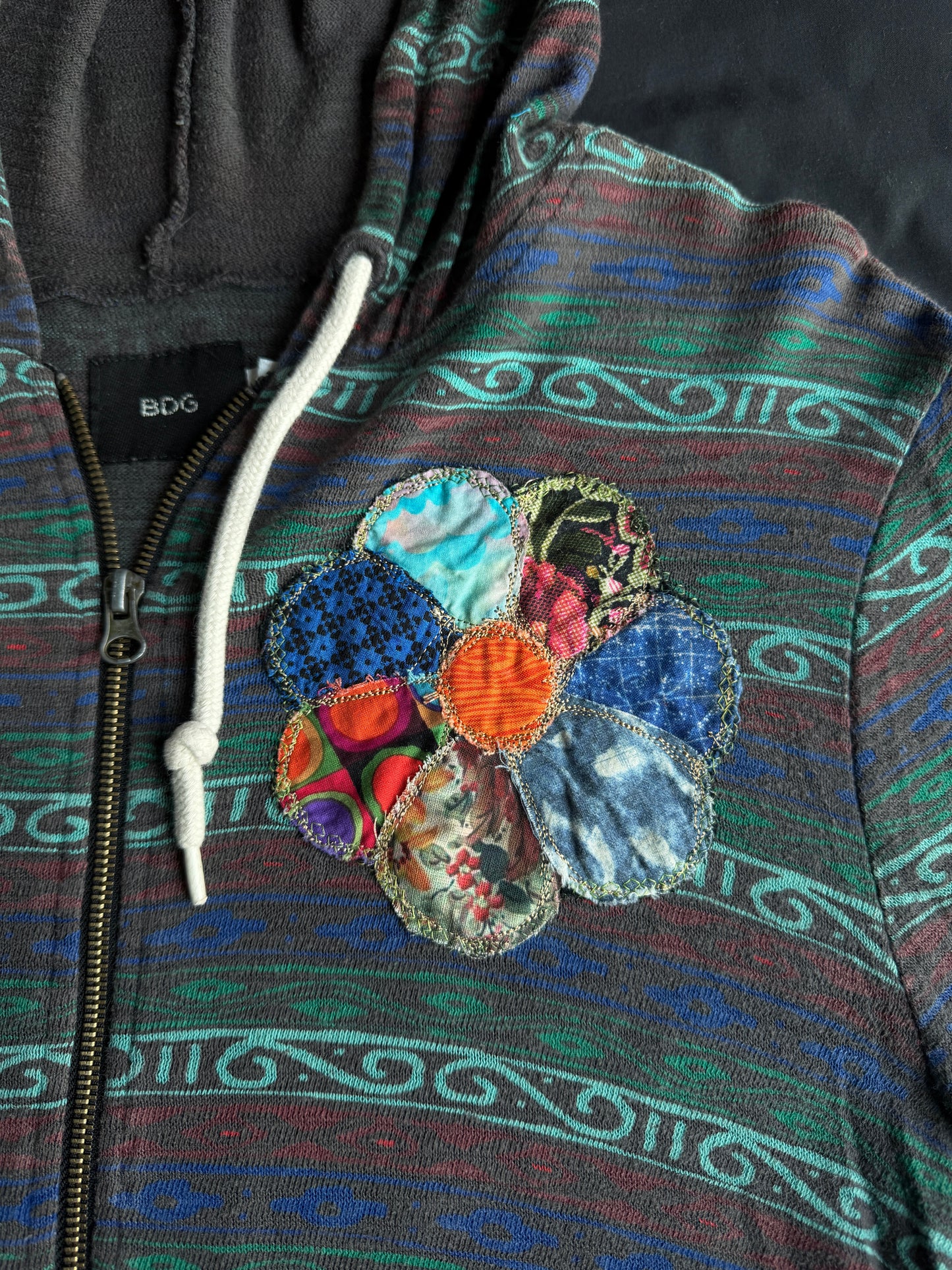 Scrappy clown flower zip up