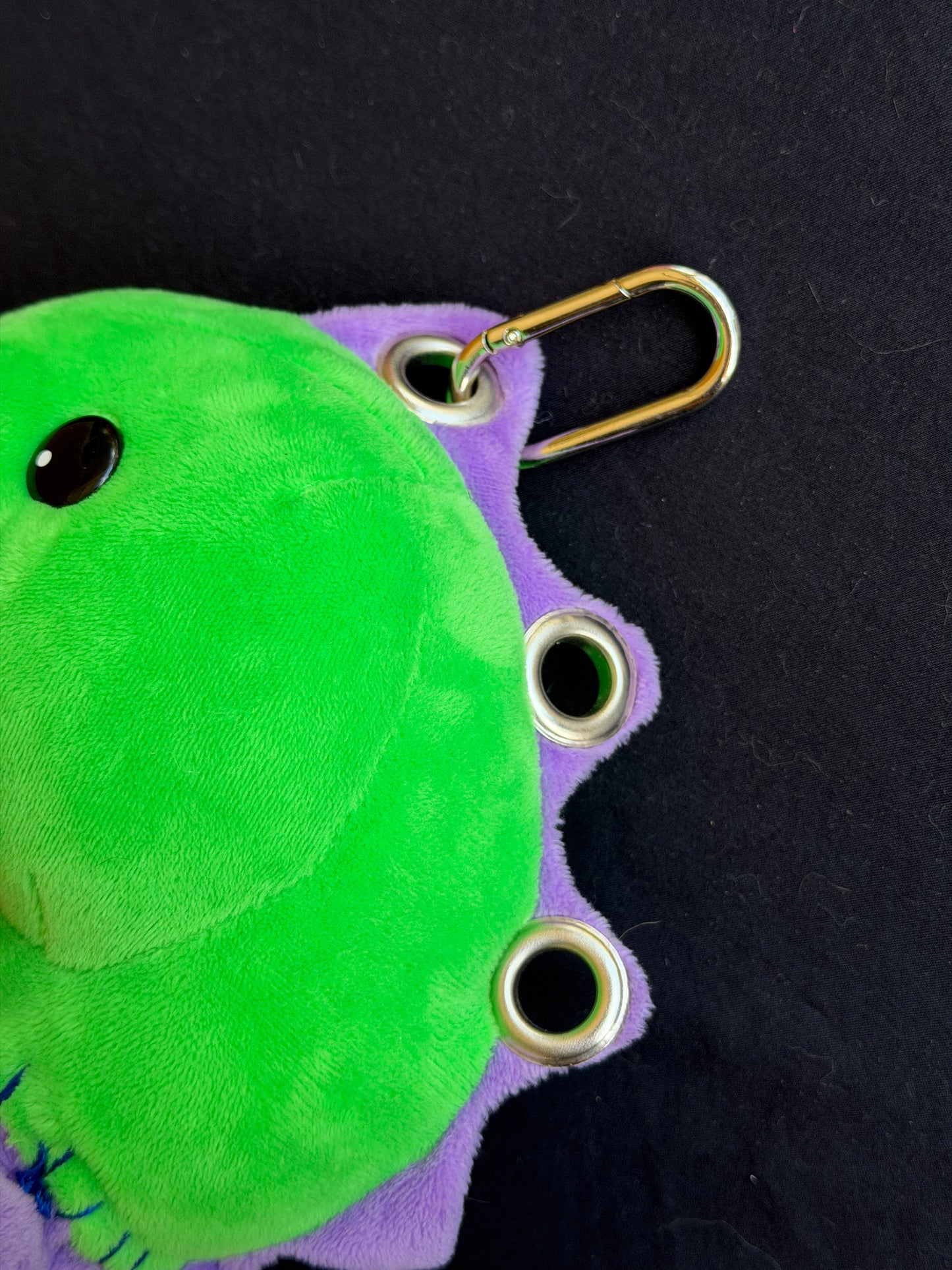 Dinosaur + purple care bear keychain buddy