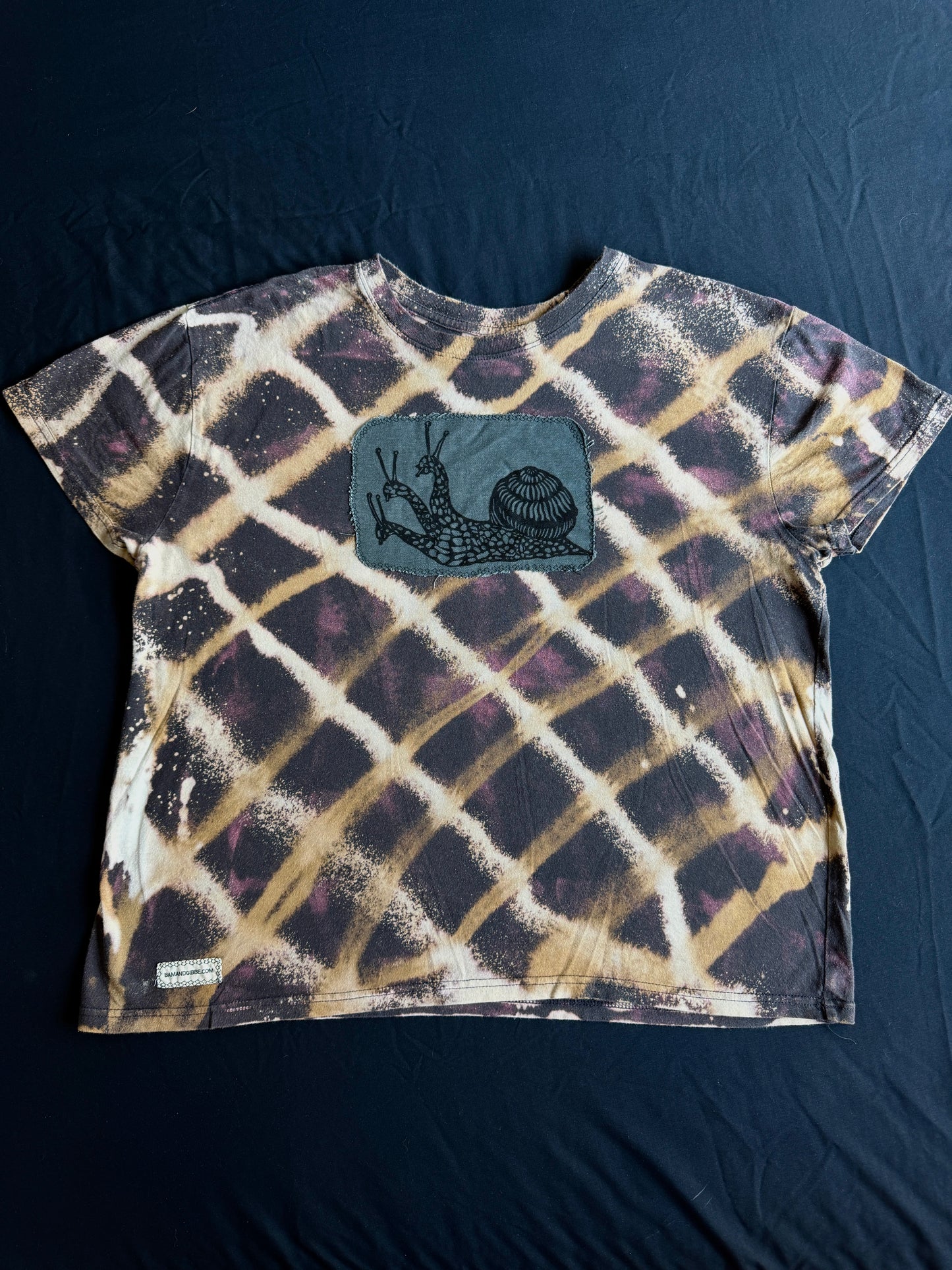 Three headed snail bleach dyed t-shirt