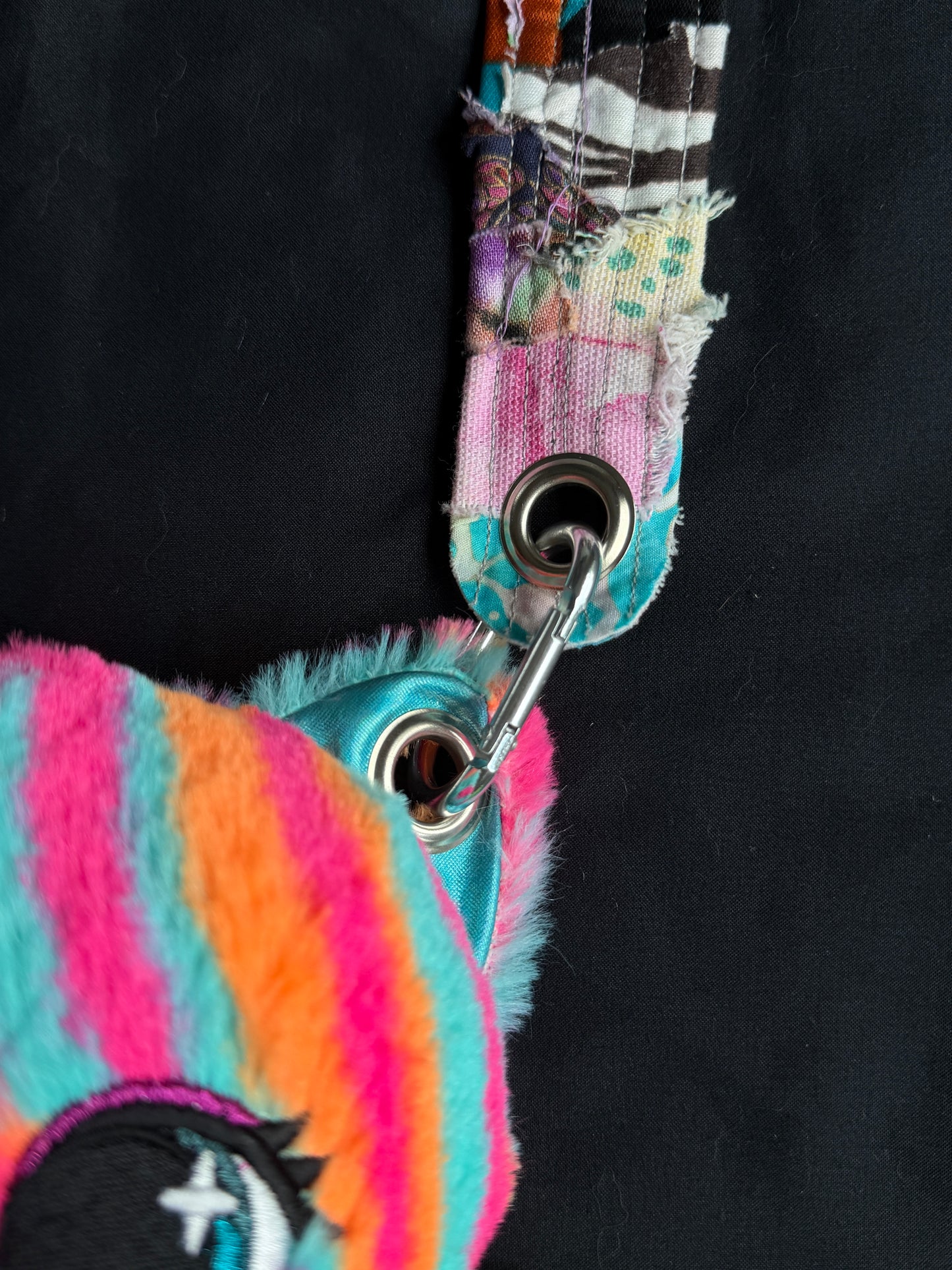 Colorful cat + dino hybrid side bag