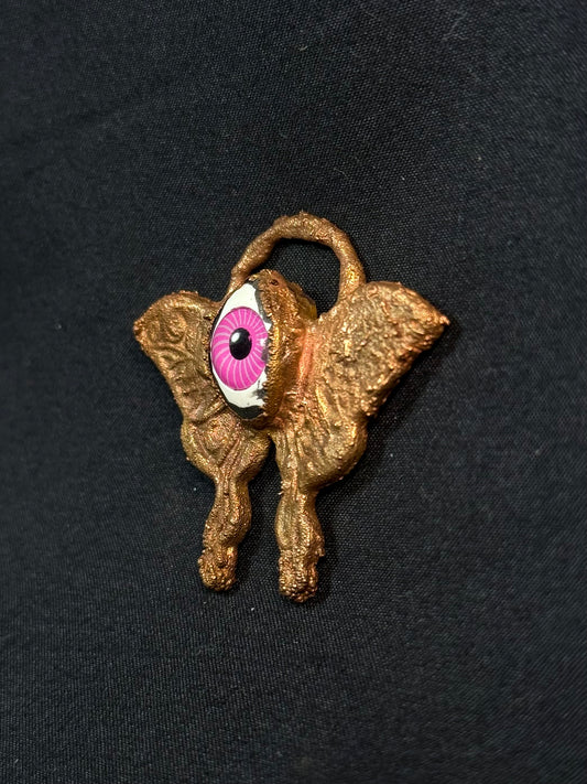 Eye butterfly amulet