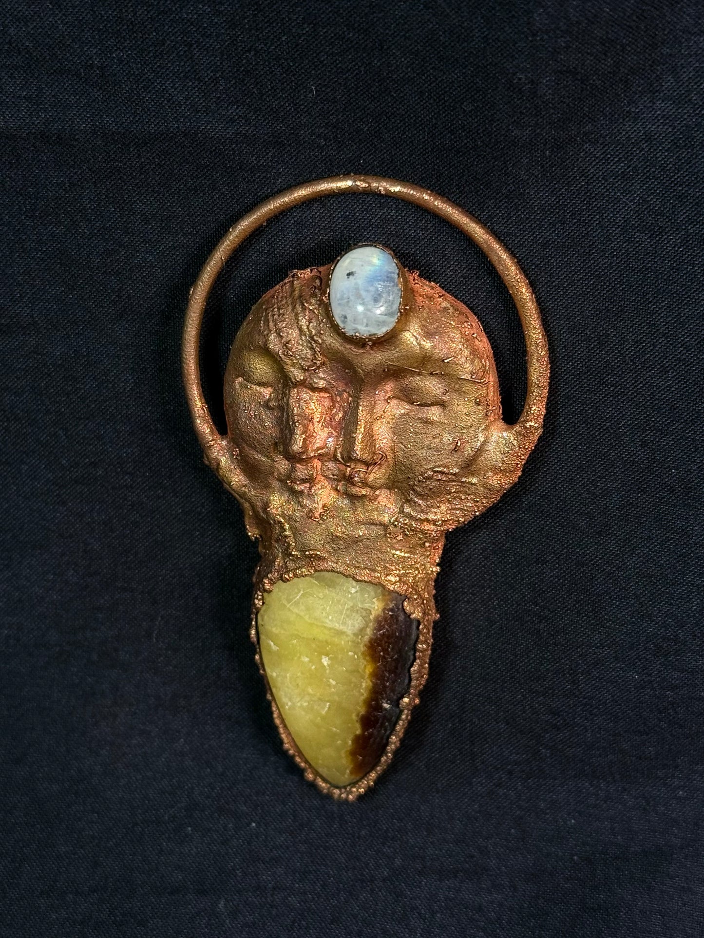 The sun and moonstone amulet