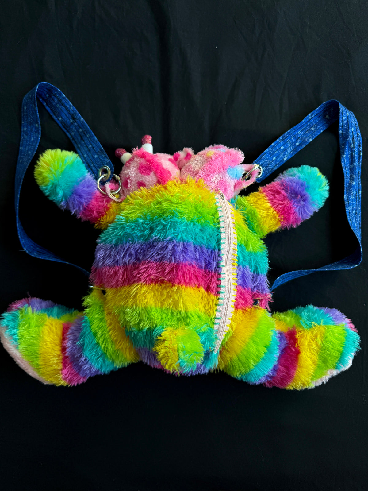 Two headed rainbow explosion hybrid back pack