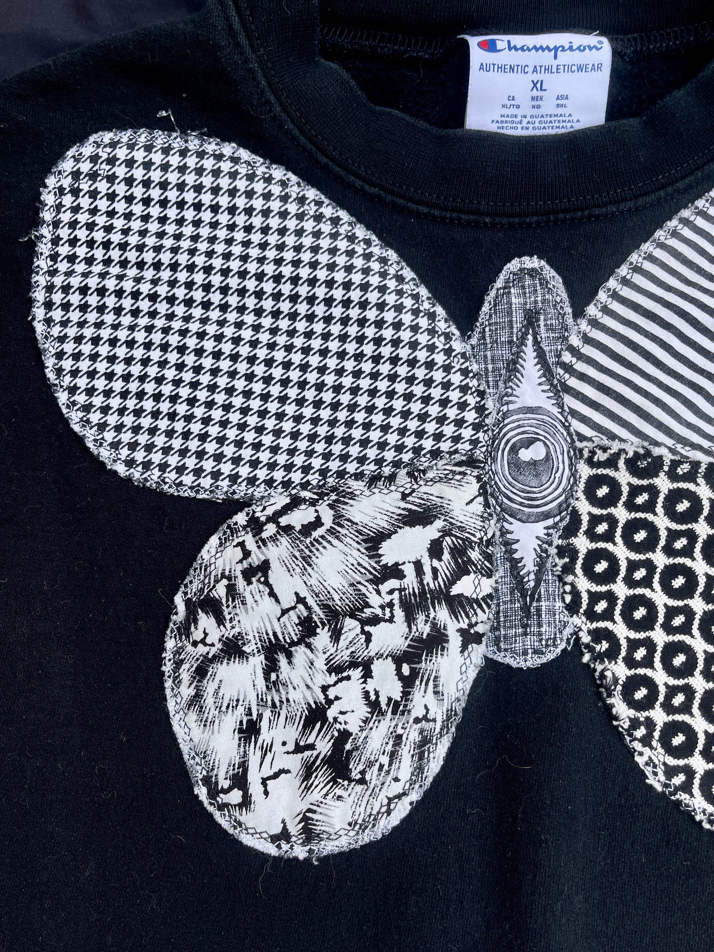 B&W butterfly + spine sweatshirt