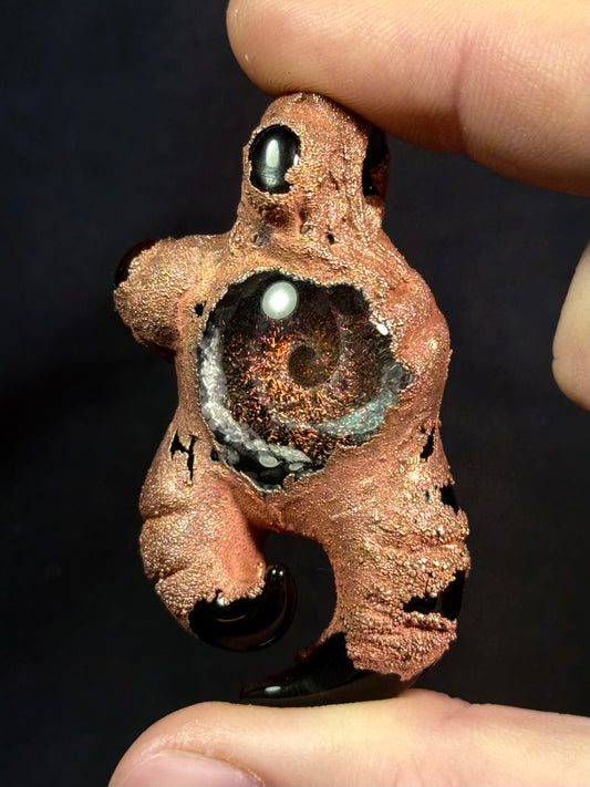 Spikey galaxy amulet