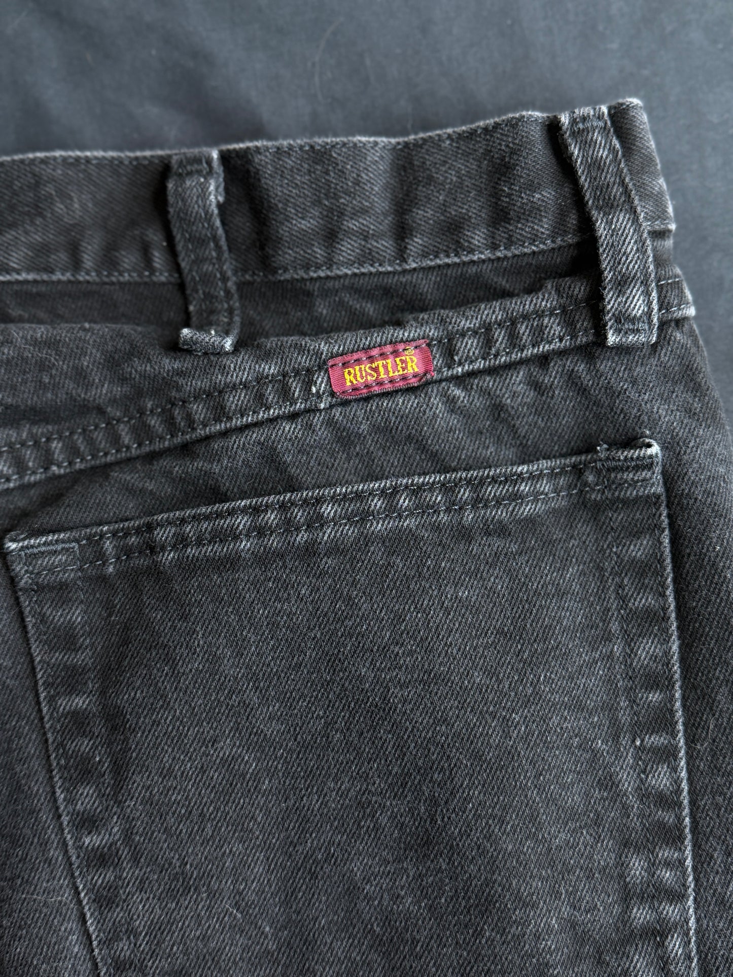 Black and white patch black jean shorts