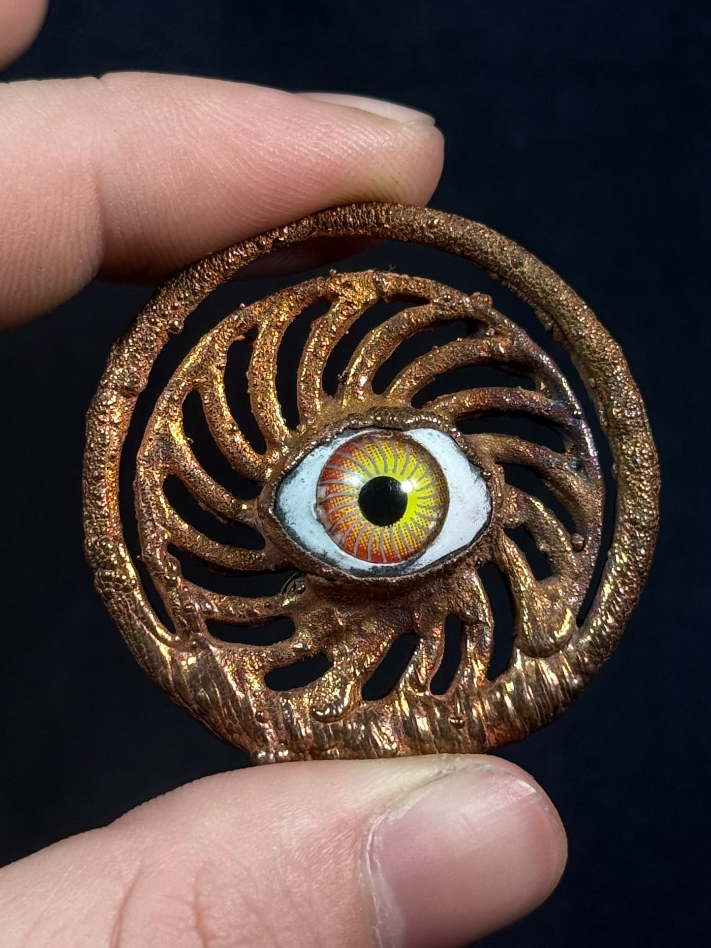 Eye spiral amulet