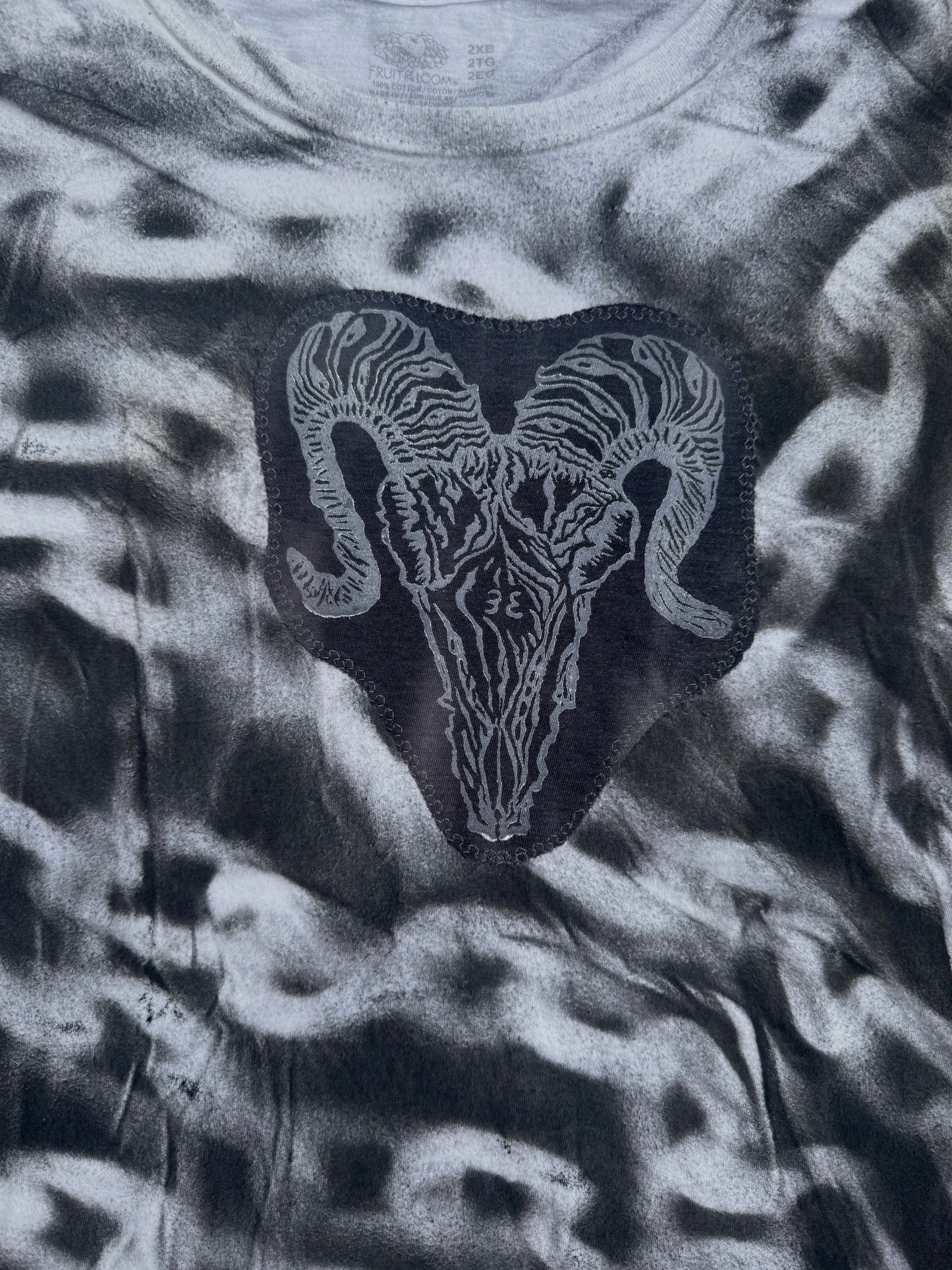 All seeing billy skull chain sprayed t shirt