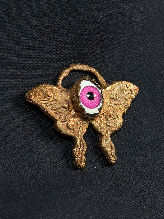 Eye butterfly amulet