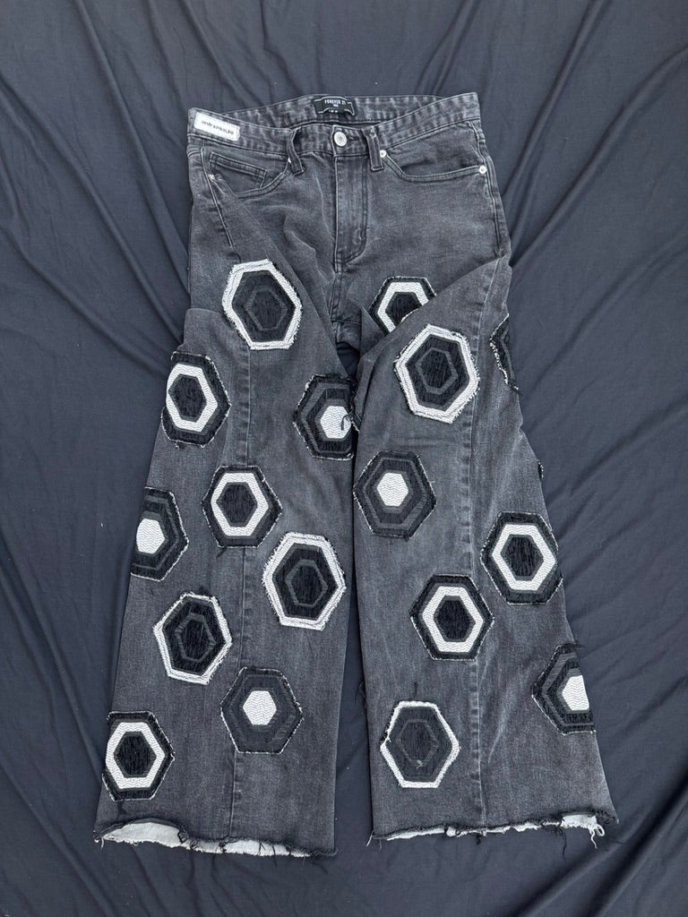 Black and white geometric denim pants with corduroy flair