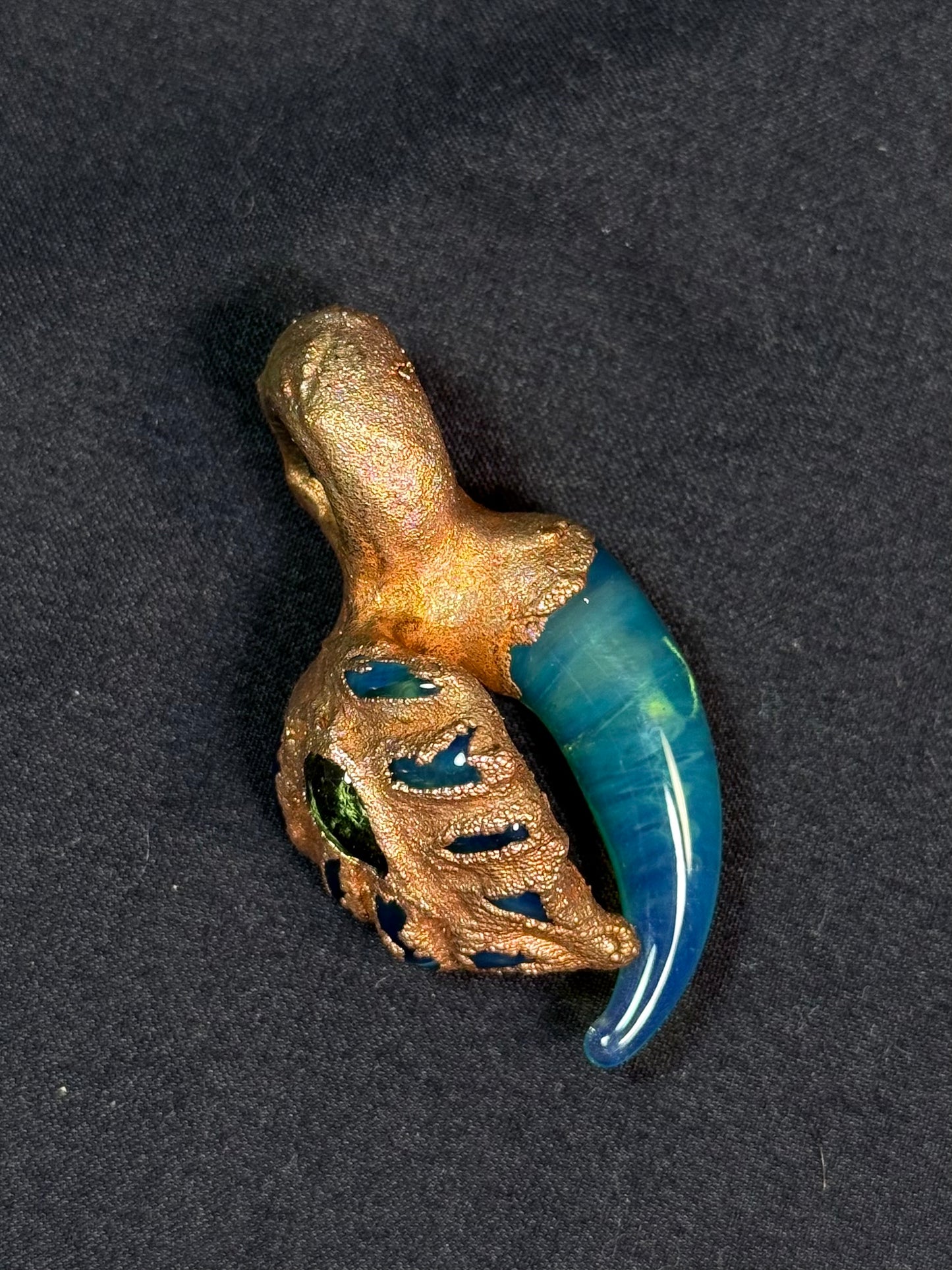 Glass leaf amulet