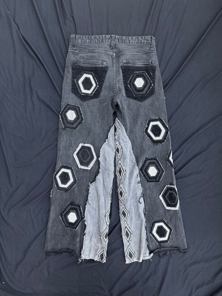 Black and white geometric denim pants with corduroy flair