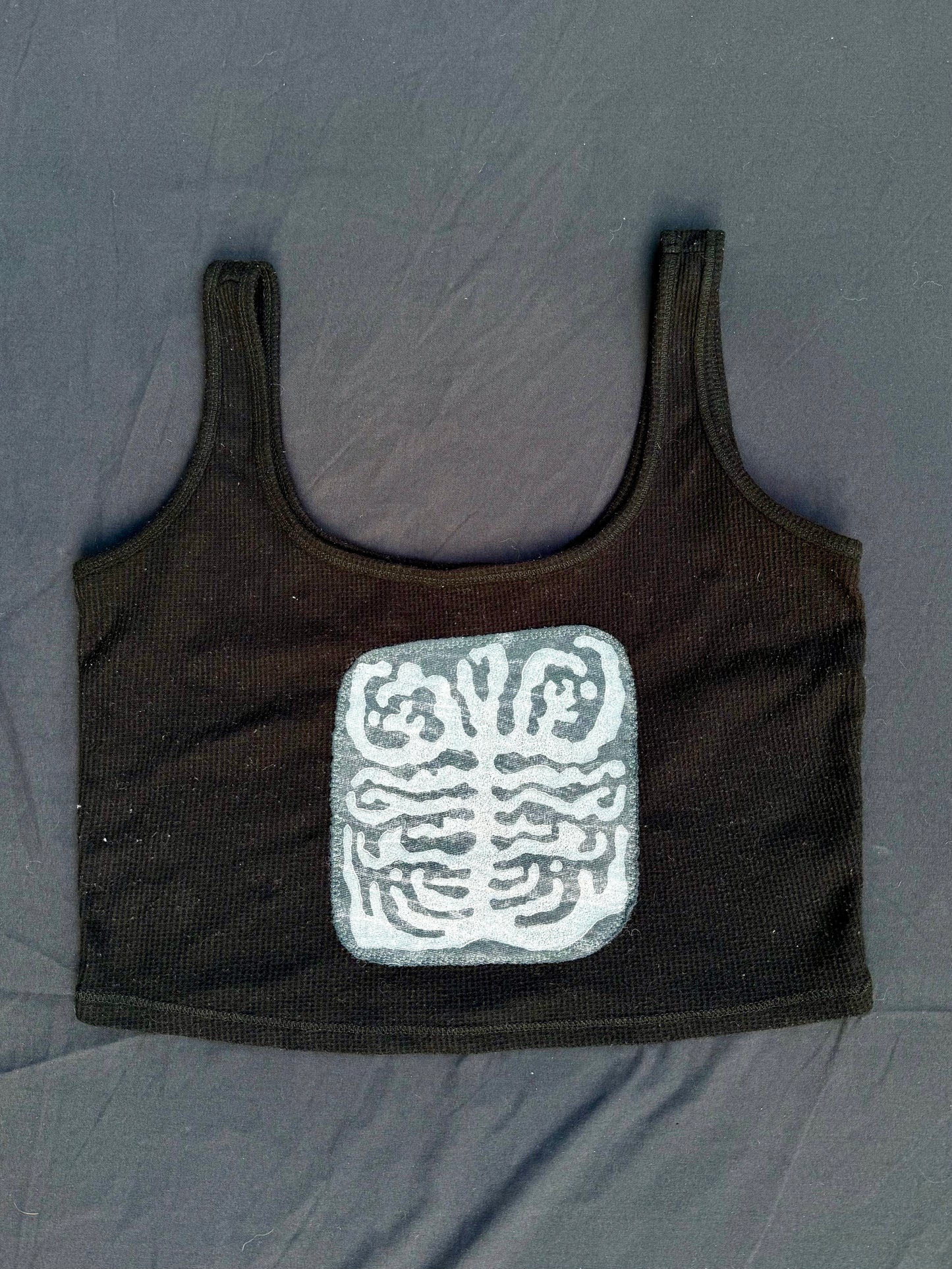 Shape patch tank top