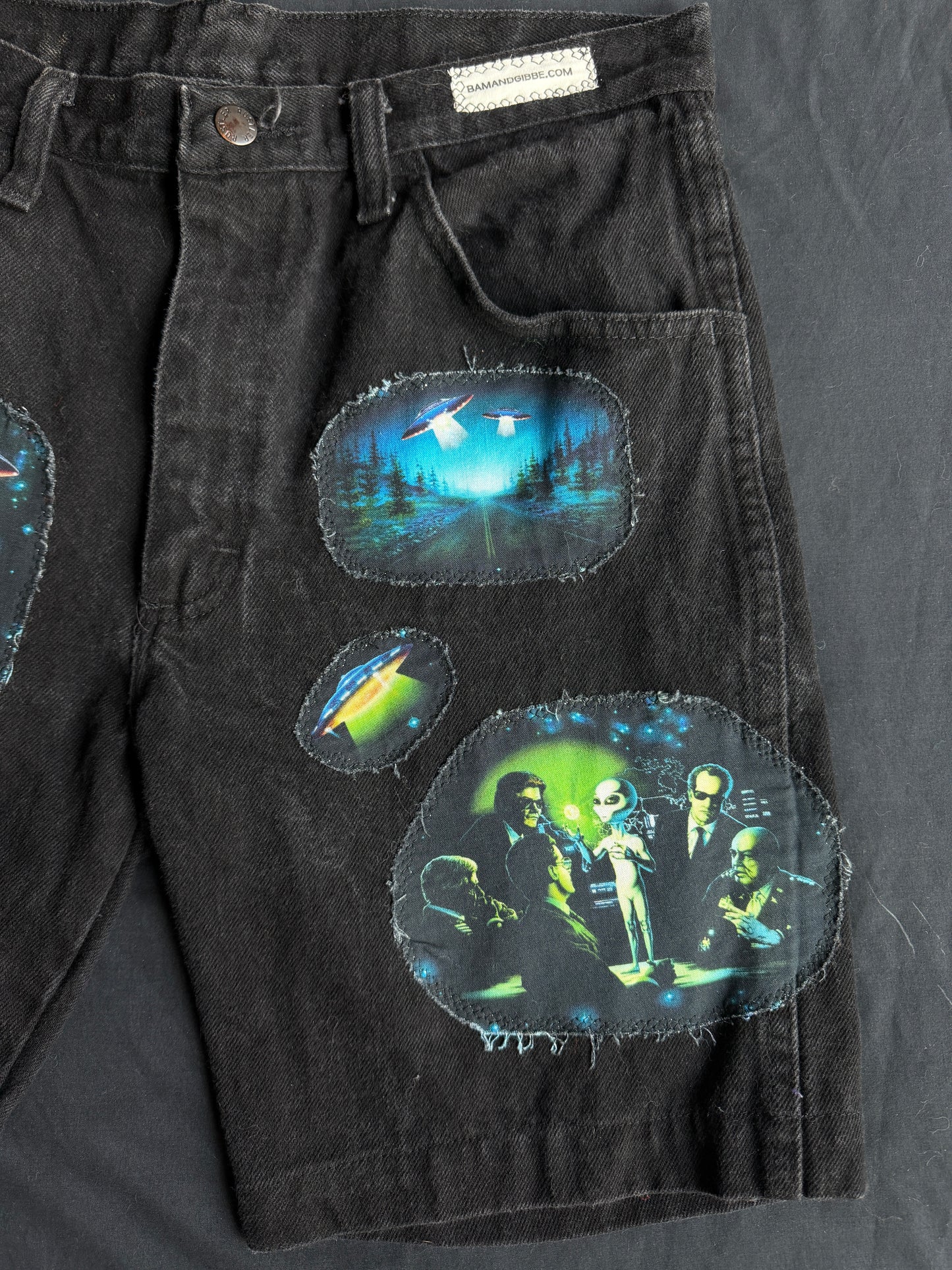 Alien + UFO black jean shorts